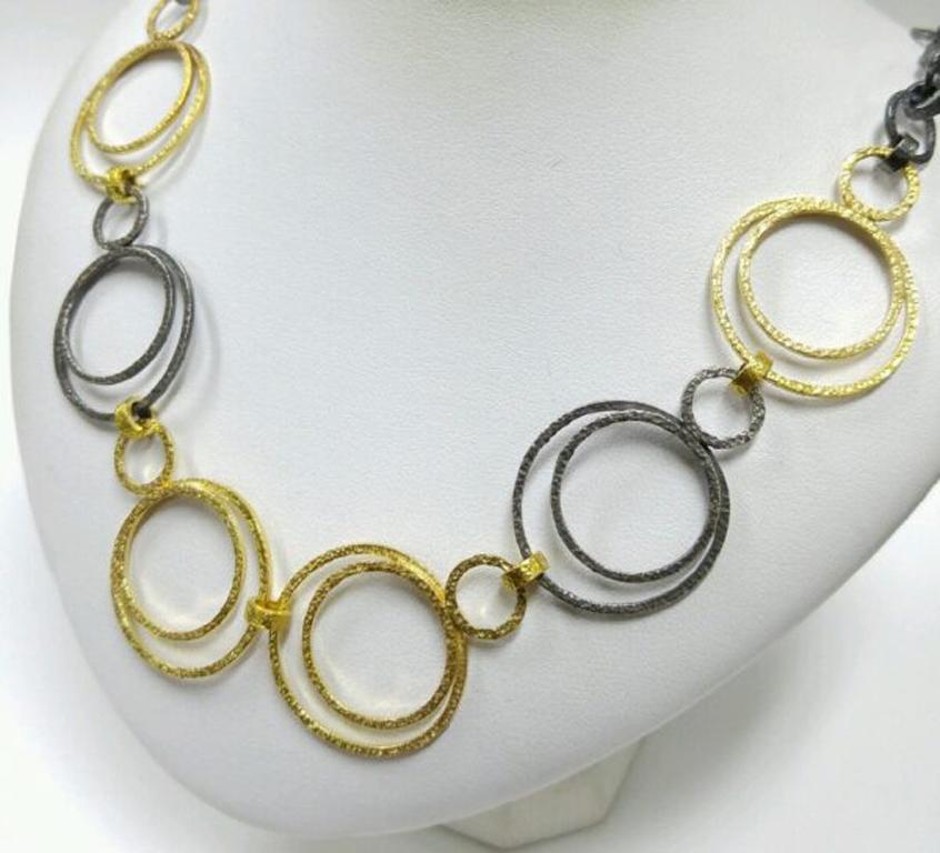 Double Circle Necklace in 22k Gold and Silver by Tagili In New Condition For Sale In New York, NY