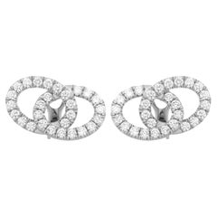 Boucles d'oreilles à double cercle superposé avec diamants en or blanc 18 carats