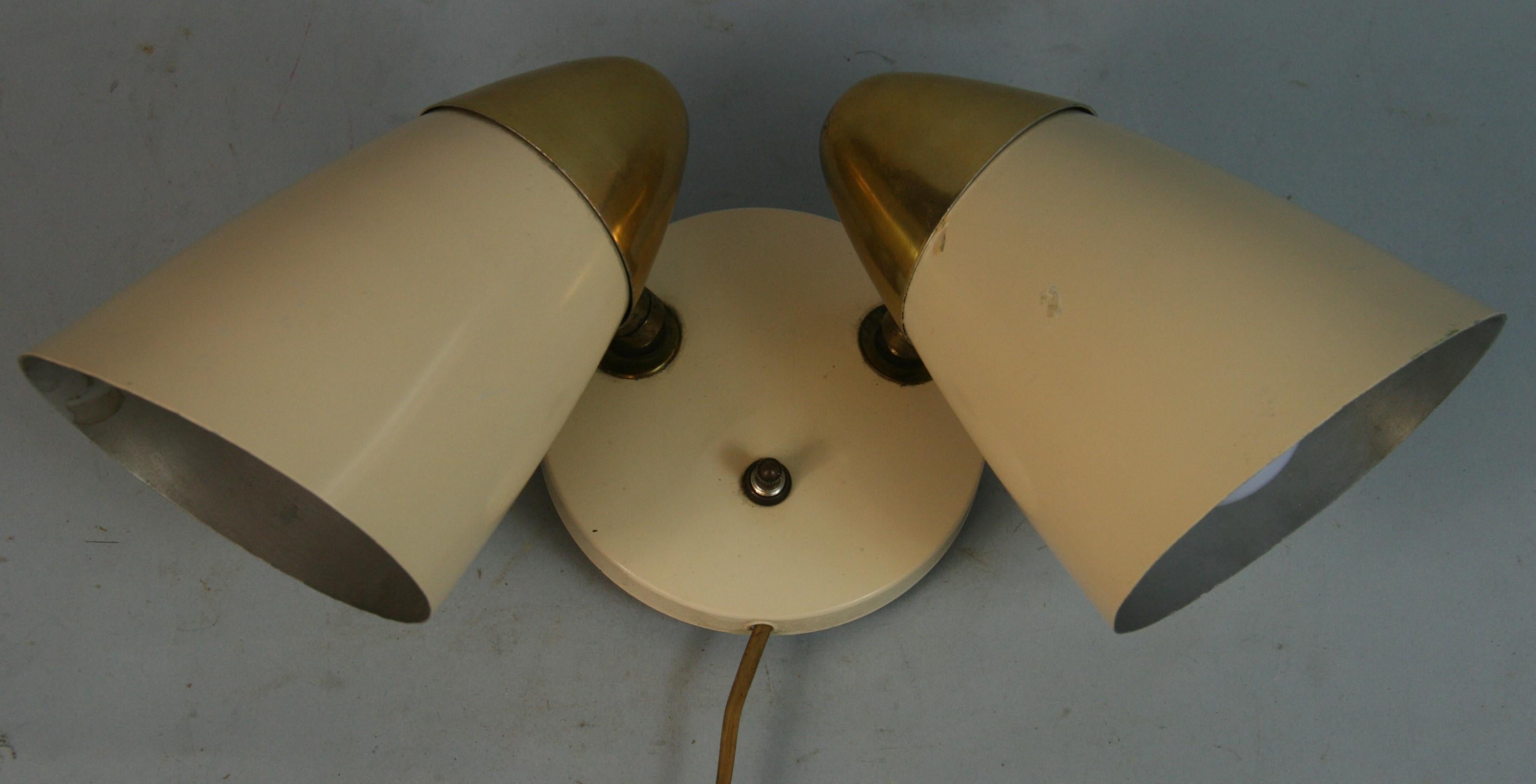 1567 Single double light swivel cone sconce 
Takes 60 watt Edison based bulb