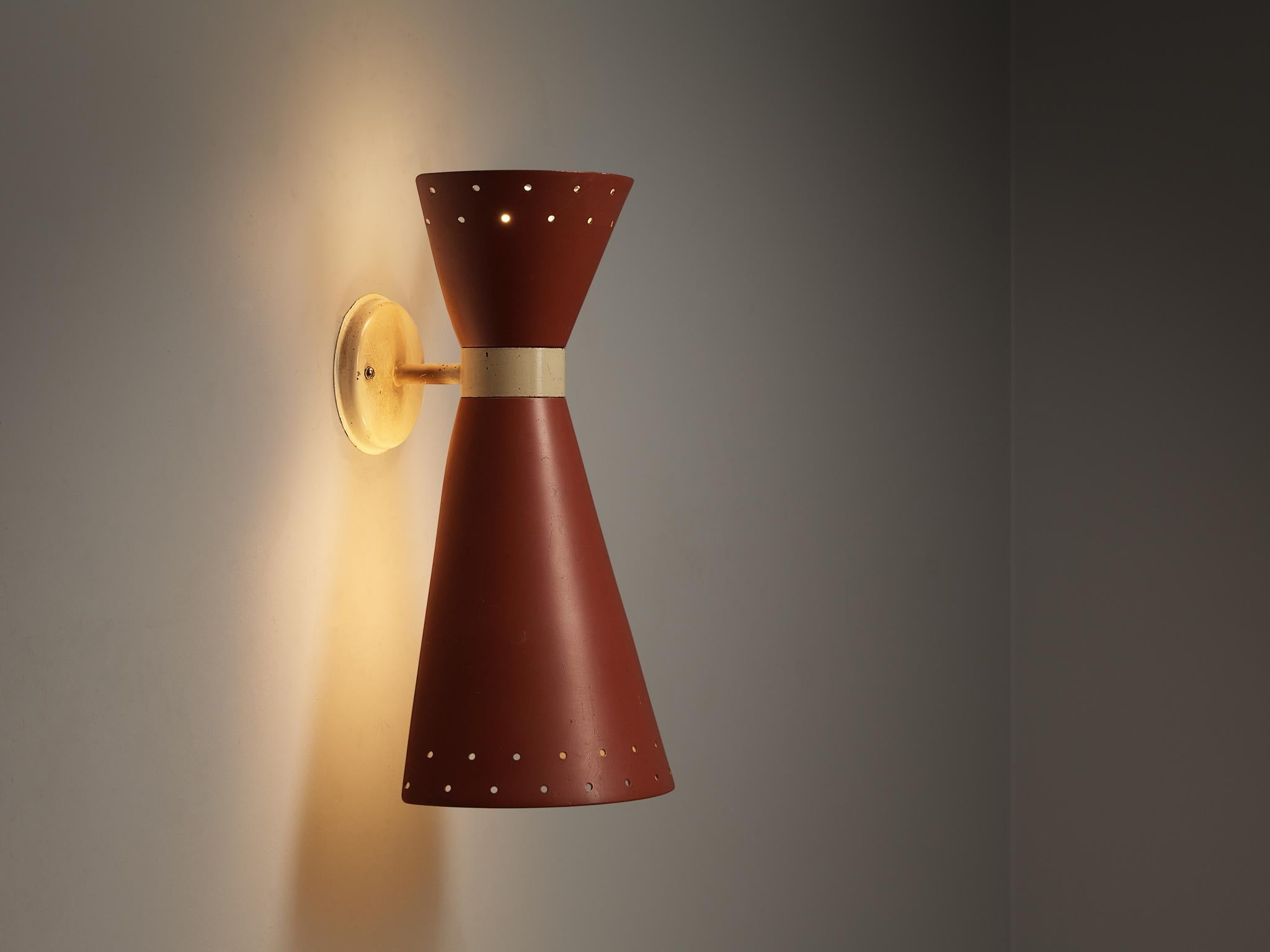 Wall light, coated aluminum, lacquered steel, Europe, 1950s

This wall light features conical-shaped shades on both sides executed in an earth-toned red color. Emitting light both upward and downward, this fixture engenders a warm and inviting