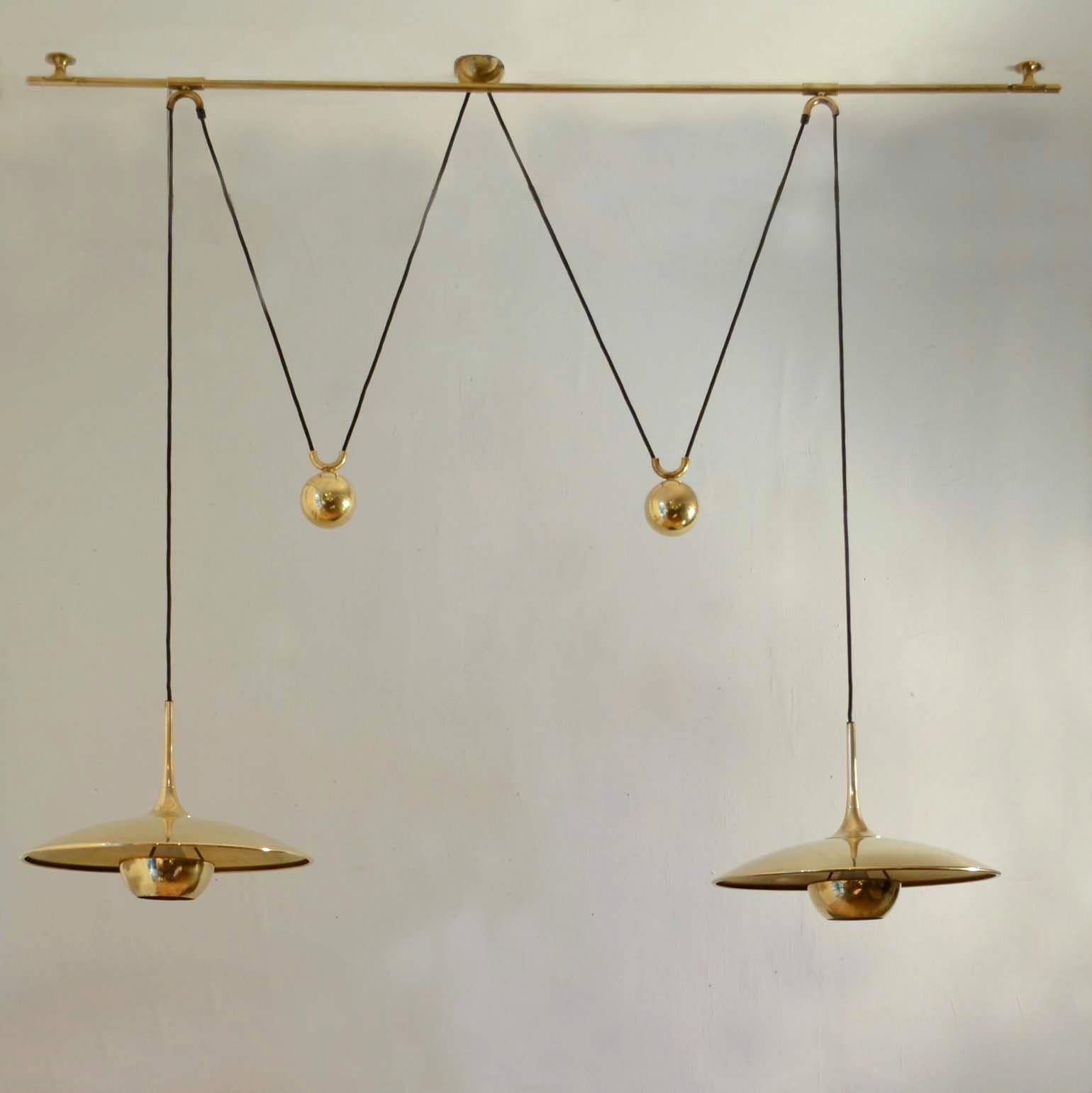 German Double Counterbalance Pendant Lamps Onos 40 in Brass by Florian Schulz, 1970s