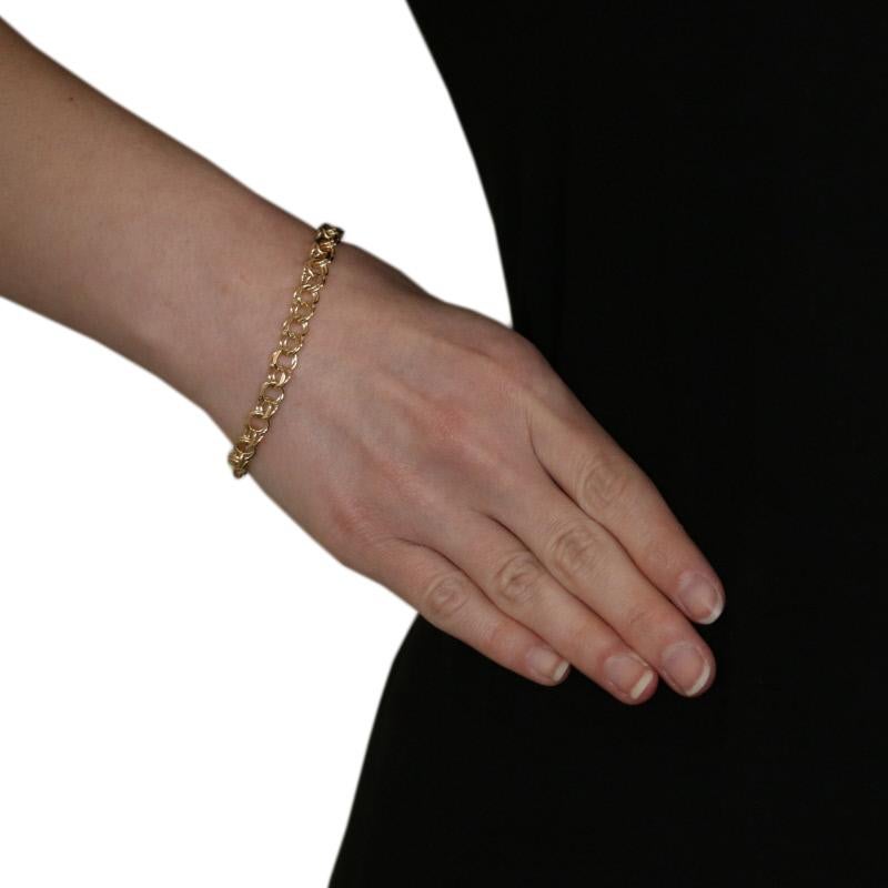 Country of Origin: Peru
Metal Content: Guaranteed 14k Gold as stamped
Chain Style: Double Curb 
Measurements: length 7 1/4