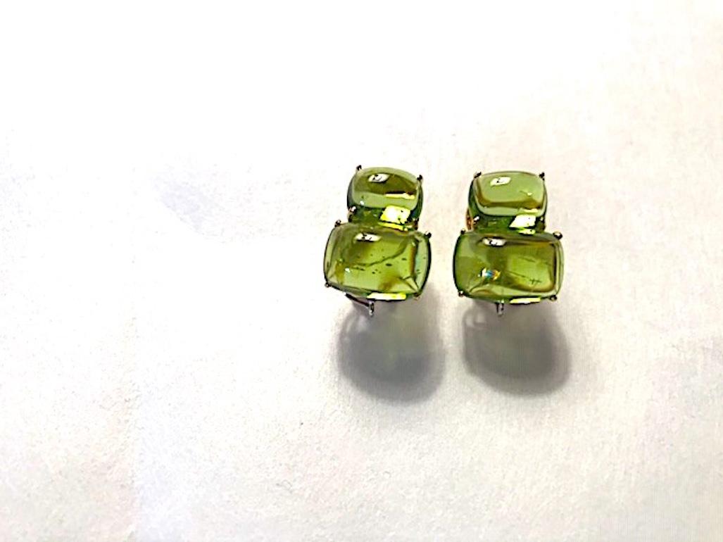 Elegant 18kt Yellow Gold Double Cabochon Cushion Peridot Earrings made for clip or pierced ears.  A detachable hanging pearl can be added as well.

This is a classic day to evening earring that can be made with a clip or pierced. The meaning
