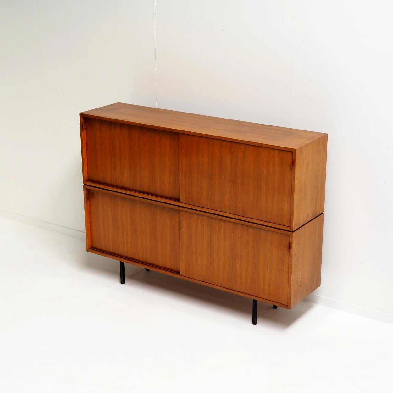 Beautiful and rare double decker sideboard designed by female designer Florence Knoll. She designed a series of these sideboards in the early 1950s which were produced until the late 70s early 80s. No longer produced today.

It was the high-end