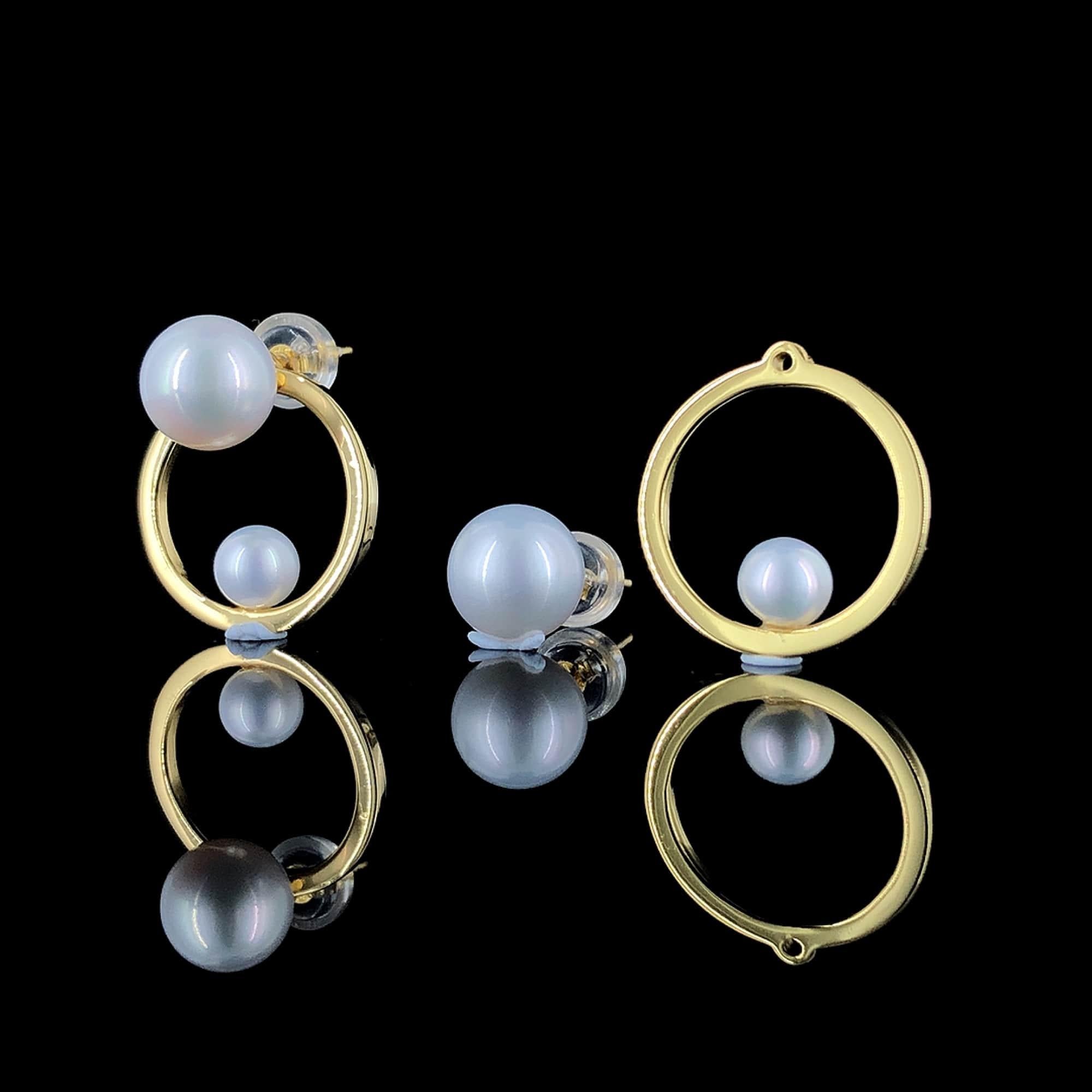 Rehaussez votre style avec ces exquises boucles d'oreilles deux-en-un en eau douce, méticuleusement fabriquées en argent sterling véritable et ornées d'une finition dorée rayonnante. Ces boucles d'oreilles sont l'incarnation de l'élégance