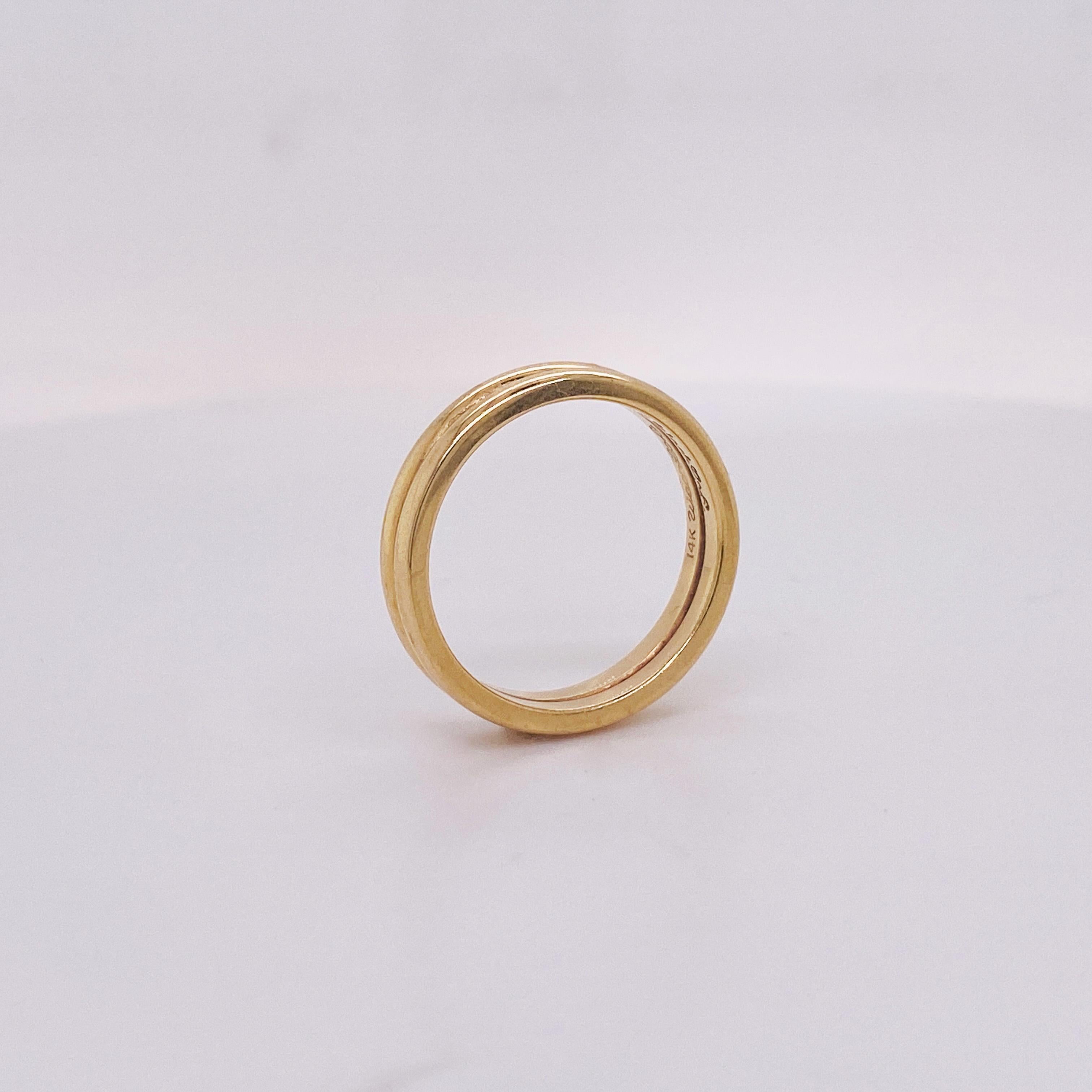 These twin bands form one ring in a simple and classic style double dome wedding band. These rings were made in 1950 and you could wear this well-preserved piece of history every day! Two identical slender bands are soldered securely together into a