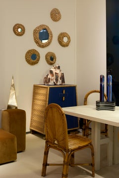 Double-door rattan and leather cabinet by Ronald-Cecil Sportes, ca. 1999