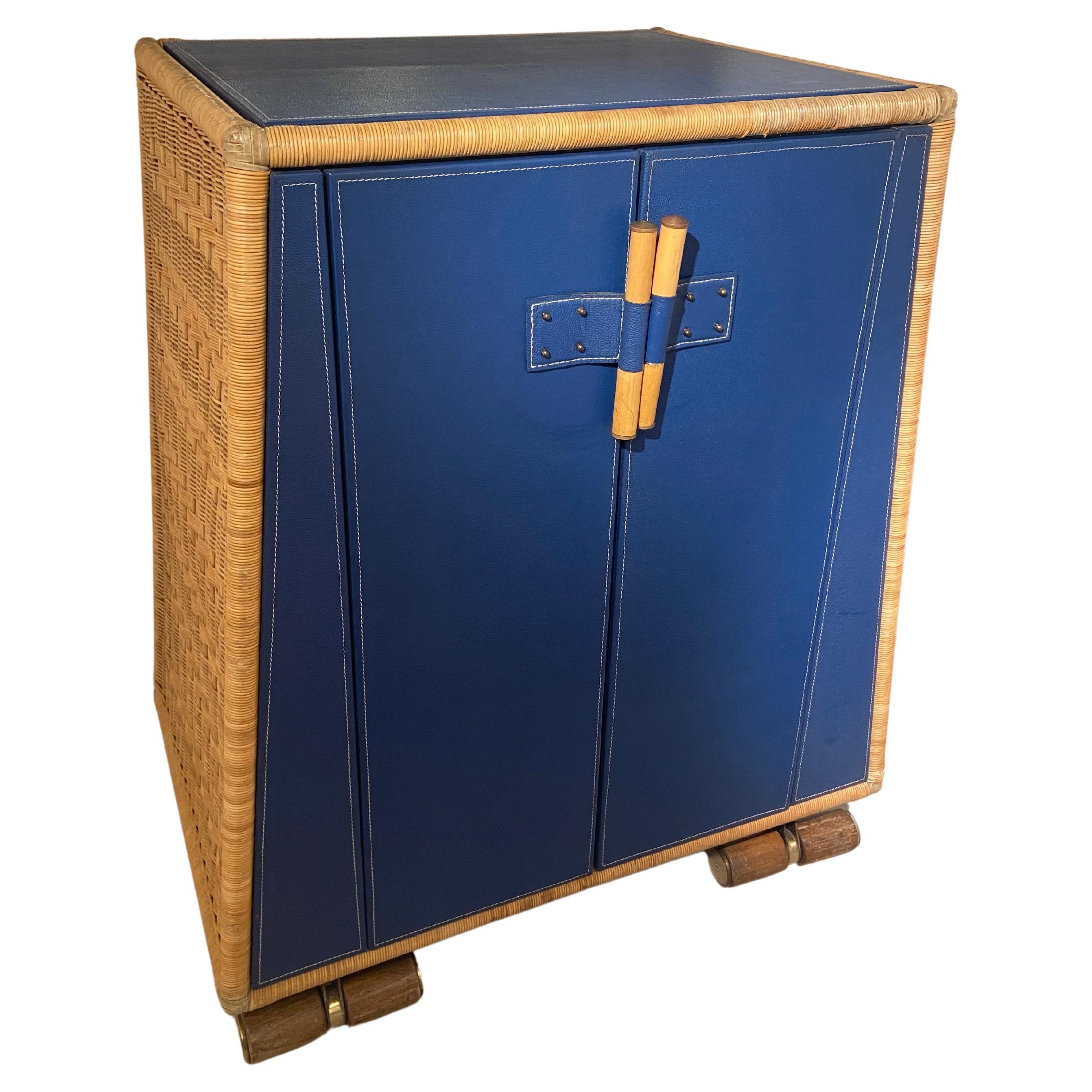 Double-door rattan and leather cabinet by Ronald-Cecil Sportes, ca. 1999