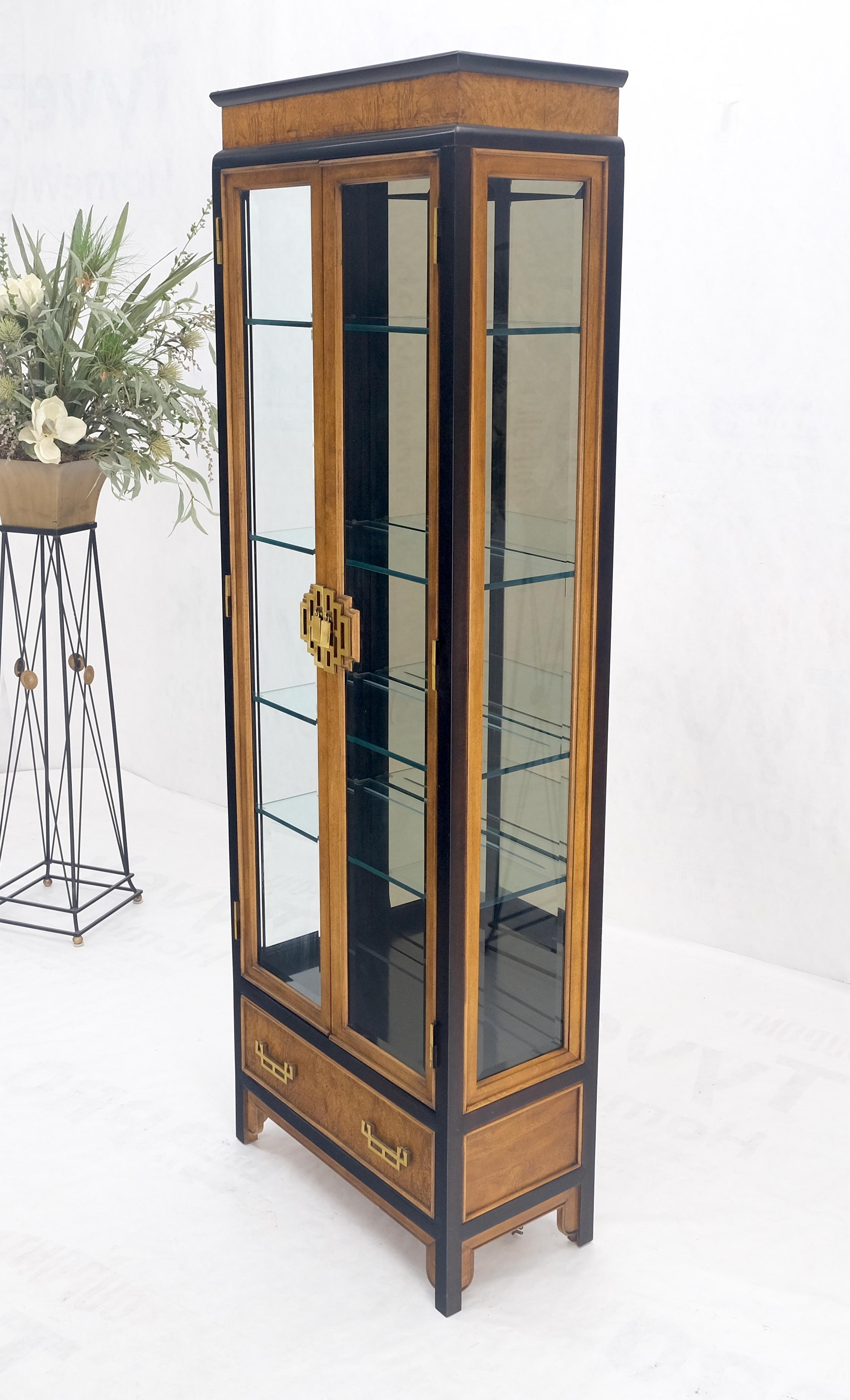 narrow black cabinet with glass doors