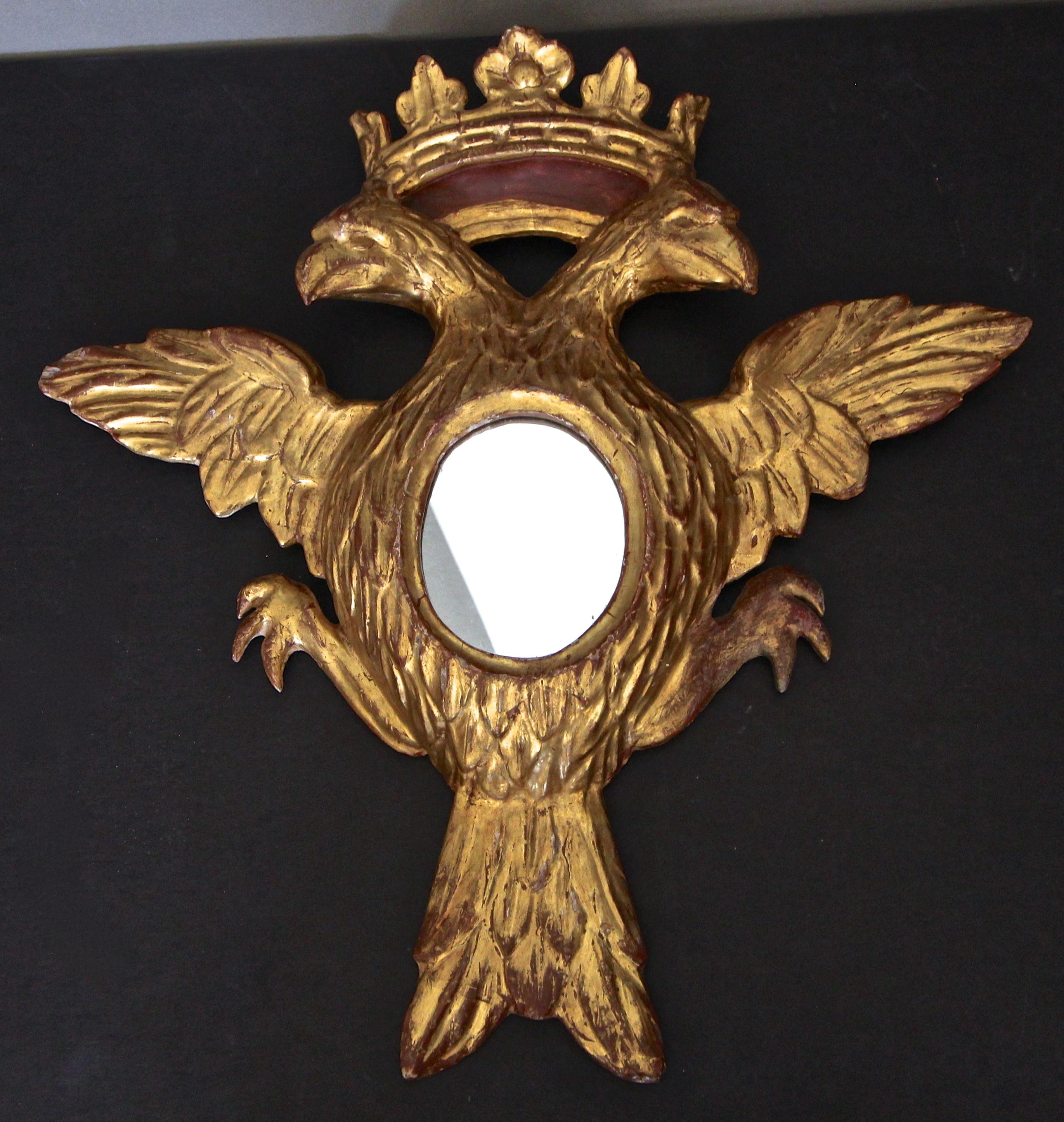 Expertly carved water gilt and gesso wood Russian double eagle crest and crown wall art mirror. Mirror 17.75