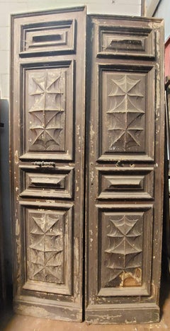 Double entrance door in larch carved and lacquered from Turin (Italy)