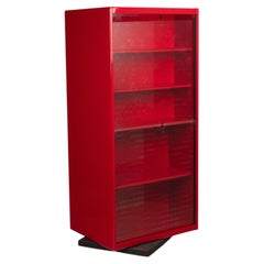 Double-face rotating display cabinet in red lacquer by Arflex, 1980s