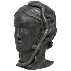 Sculpture en terre cuite à double face de figures mythologiques