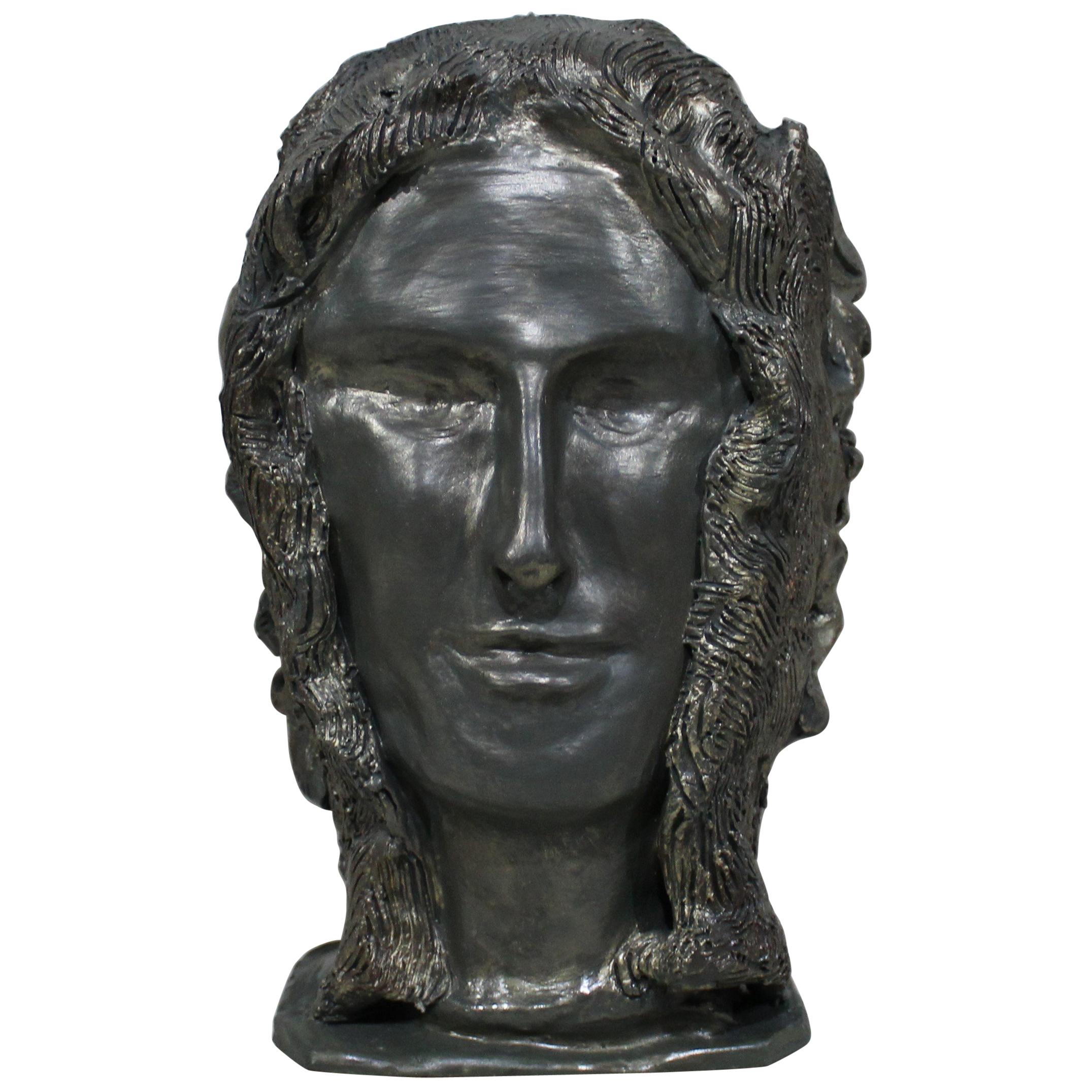 Scultura in terracotta bifronte di divinità mitologiche romane