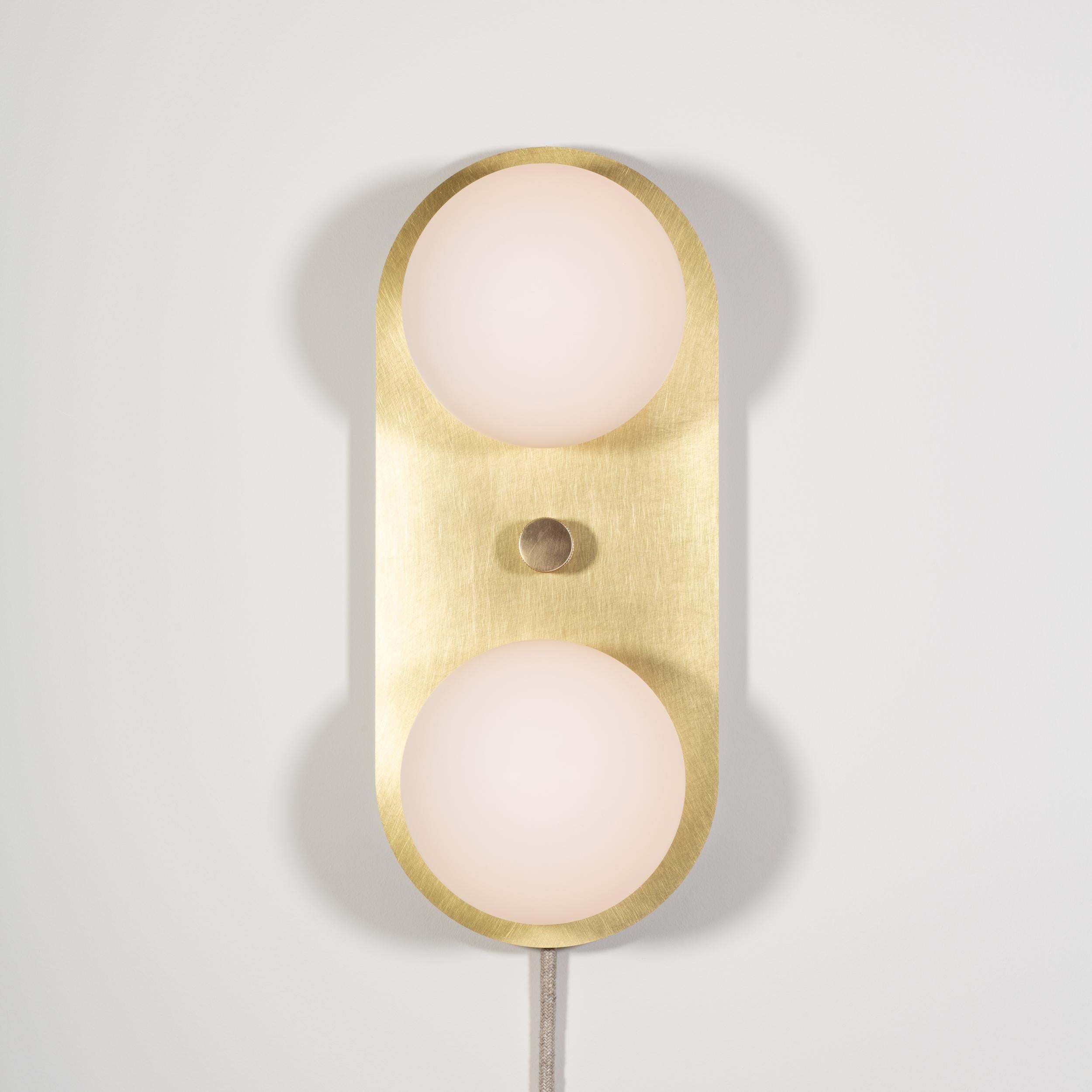 Capsule Double Globe Wall Light
97CRI Dimmable Tala G9 3.6W LEDs | 720 Lumen
Integrated LED dimmer. Linen Fabric Cable Surface Mount or Hard Wired.
Brushed Brass Wall Plate
Solid brass, Satin finish. Lacquered.
ø12cm matte glass globes.
MK UK plug /