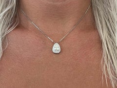 Double Halo Pear Shaped Diamond Pendant in 18k White Gold