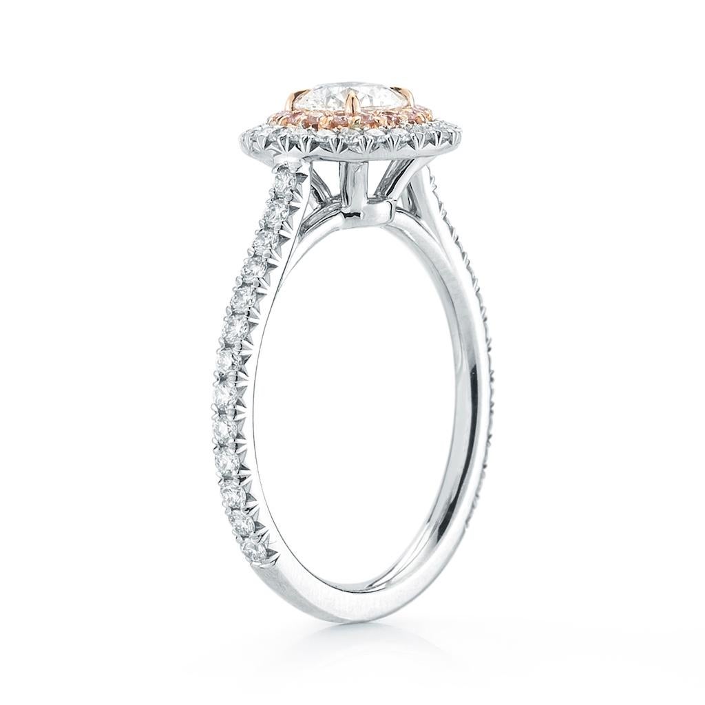 This double halo diamond ring features certified 0.61 carat round center stone. Made to order if not in stock. 

Delicate and feminine double halo pave set diamond engagement ring is so pretty and sparkling it will leave everyone guessing how much