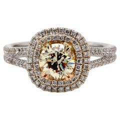 Double Halo Ring with GIA certified T/VS2 Round Diamond Center. D1.46ct.t.w.