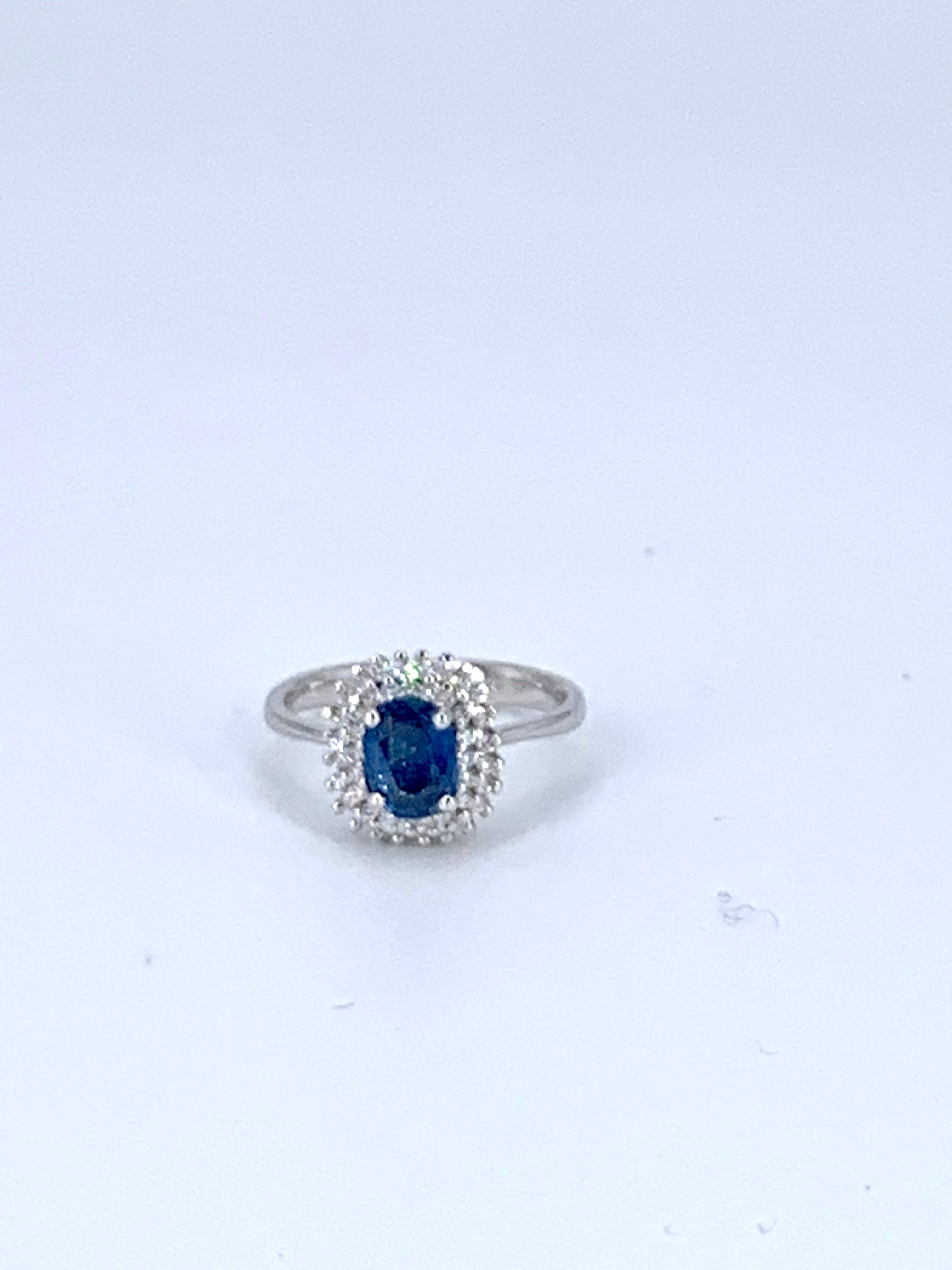 This double halo contemporary Sapphire is 1.12 Carats with 0.34 Carats of diamonds around it. The double halo effect is given with 2 layers (double) the normal halo effect, gifting the Sapphire in the centre more light and beauty. 

Set in 18Kt