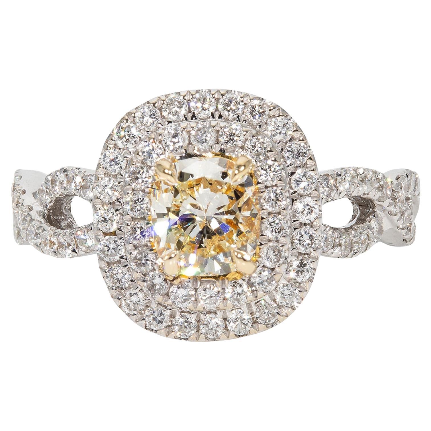 Double Halo Split Shank Ring with Fancy Yellow Cushion Diamond Center. D1.34ct.