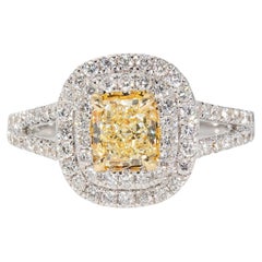 Double Halo Split Shank Ring with Fancy Yellow Radiant Diamond Center.  D1.25ct.