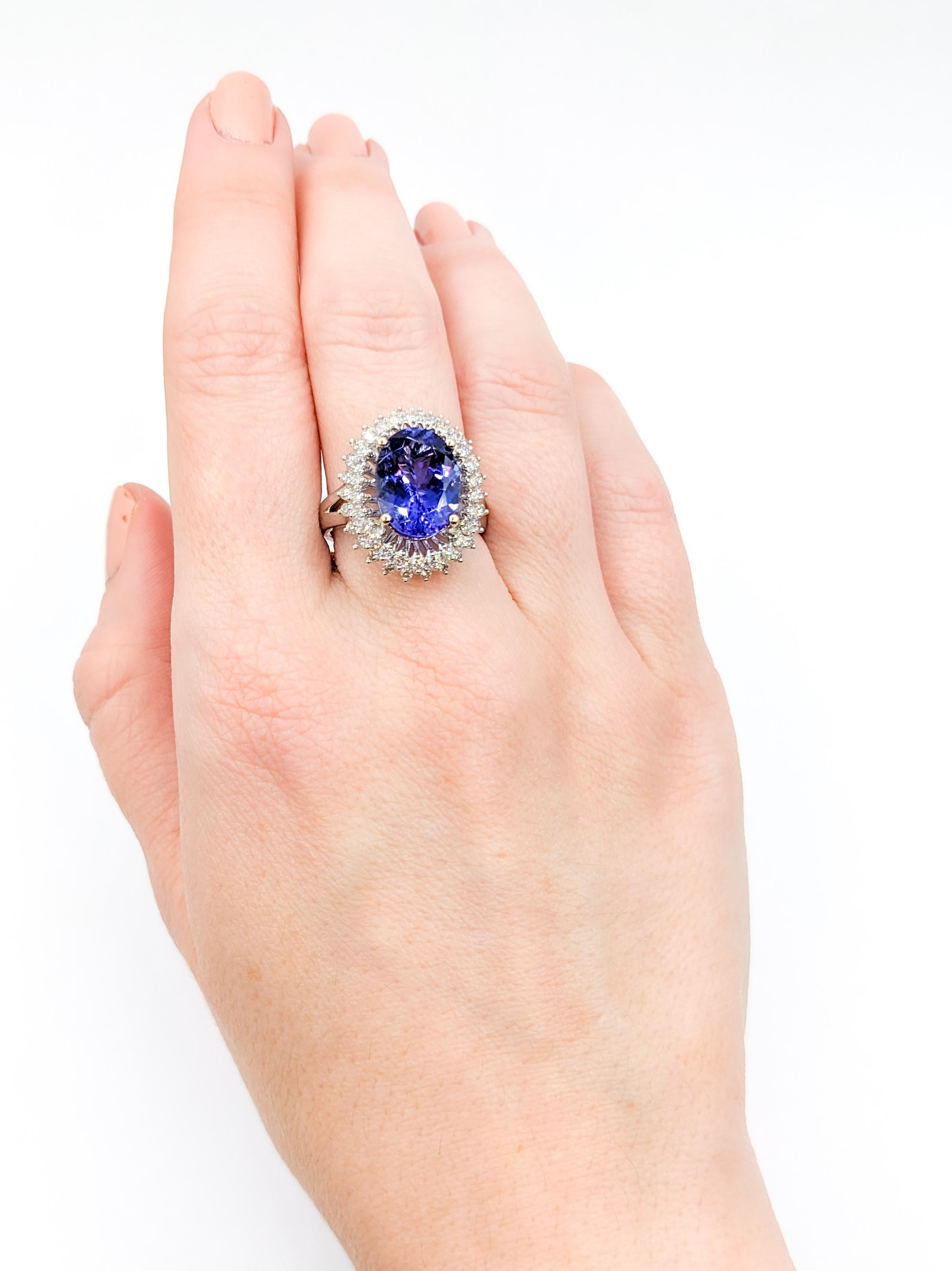 Vibrant Double Halo Tanzanite & Diamond Cocktail Ring

Embrace sophistication with this exquisite ring, meticulously shaped in lustrous 14k white gold. It boasts a collection of .72ctw round diamonds, each radiating a brilliance defined by an SI2-I1