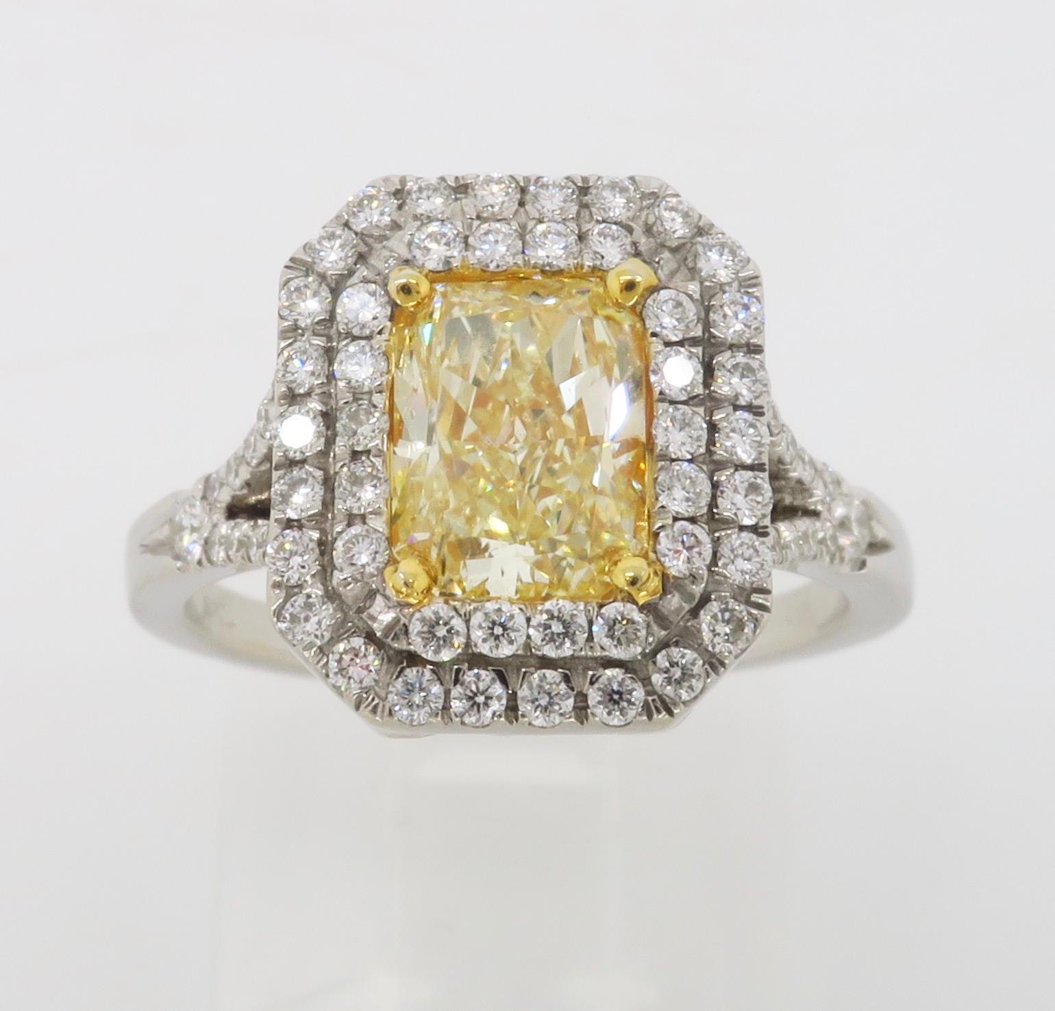 Gorgeous Radiant cut Yellow Diamond halo engagement ring made in 14k white gold. 

Center Diamond Carat Weight:  1.25CT
Center Diamond Cut: Radiant cut 
Center Diamond Color: Fancy Light Yellow
Center Diamond Clarity: VS2
Total Diamond Carat Weight: