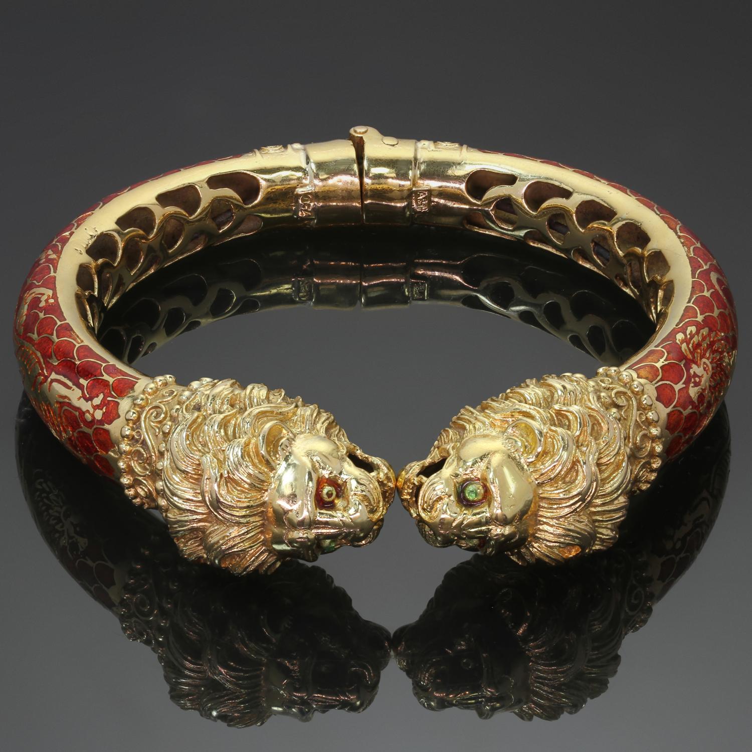 This gorgeous vintage bracelet features a double-headed chimera design intricately crafted in 18k yellow gold and red enamel and accented with gorgeous gold leaping lions on both sides of the bangle. Makers Mark A.5F.  Made in Greece circa 1980s.
