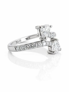 Bague en or blanc 18 carats avec diamant en forme de double cœur