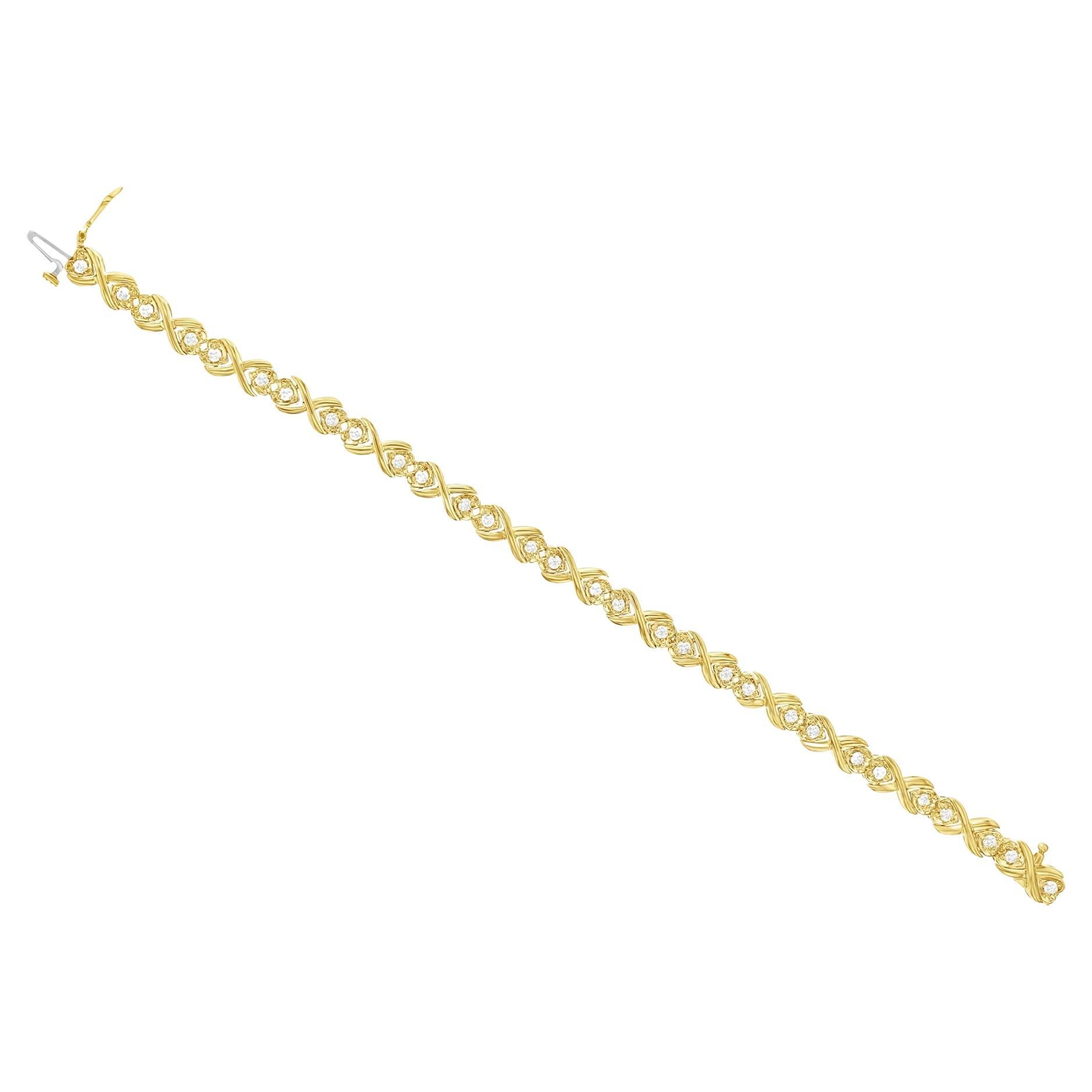 Bracelets tennis en or jaune 14 carats reliés par un double cœur de 1,25 carat poids total