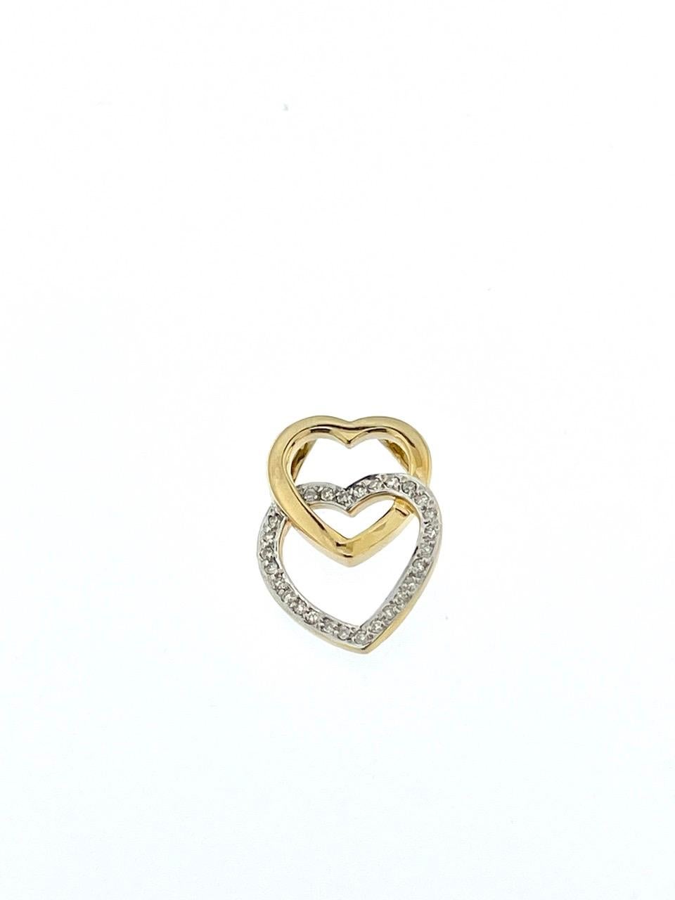 The Double Heart Pendant with Chain in Yellow and White Gold with Diamonds is an enchanting and sophisticated piece of jewelry that beautifully symbolizes love and connection. Meticulously crafted, this pendant features a dual heart design adorned