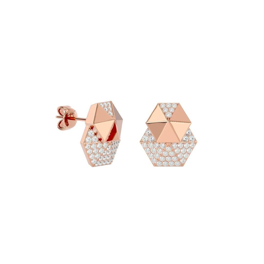 Your attention is going to be drawn to this one-of-a-kind double honeycomb design that features glittering diamonds and shiny gold. A magnificent round white diamond weighing 0.50 carats is set in these earrings. The honeycomb pattern served as the