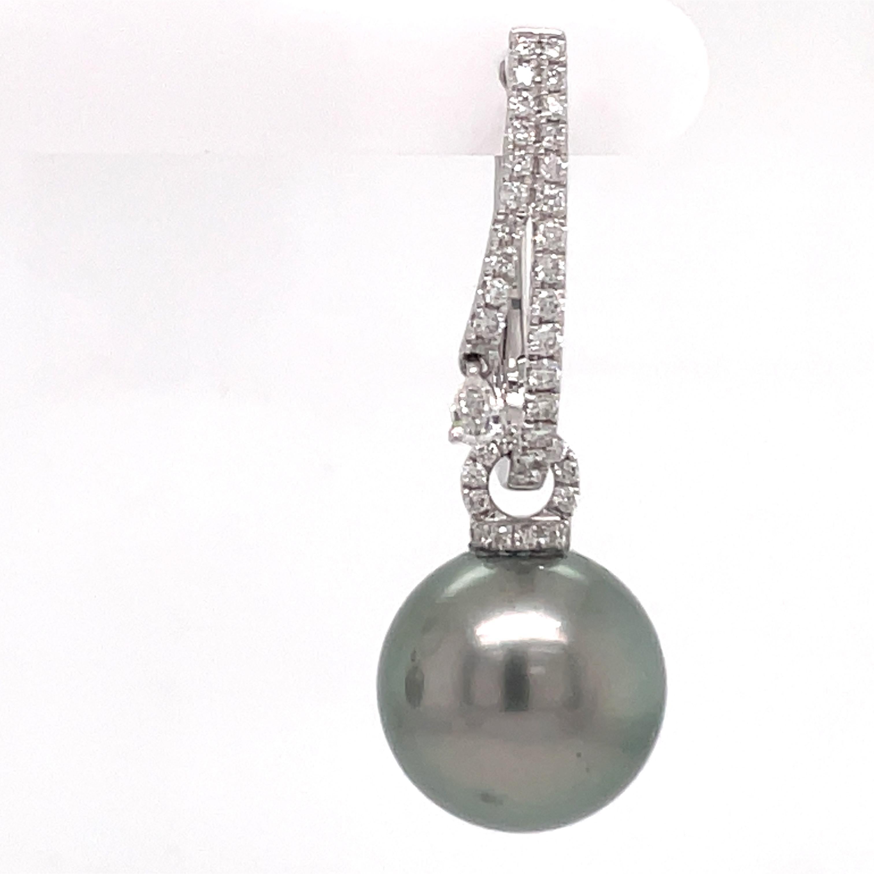 hoop earring with additional removable Tahitian pearl 
The hoop have a marquise hanging
82 diamonds 0.79 cts
