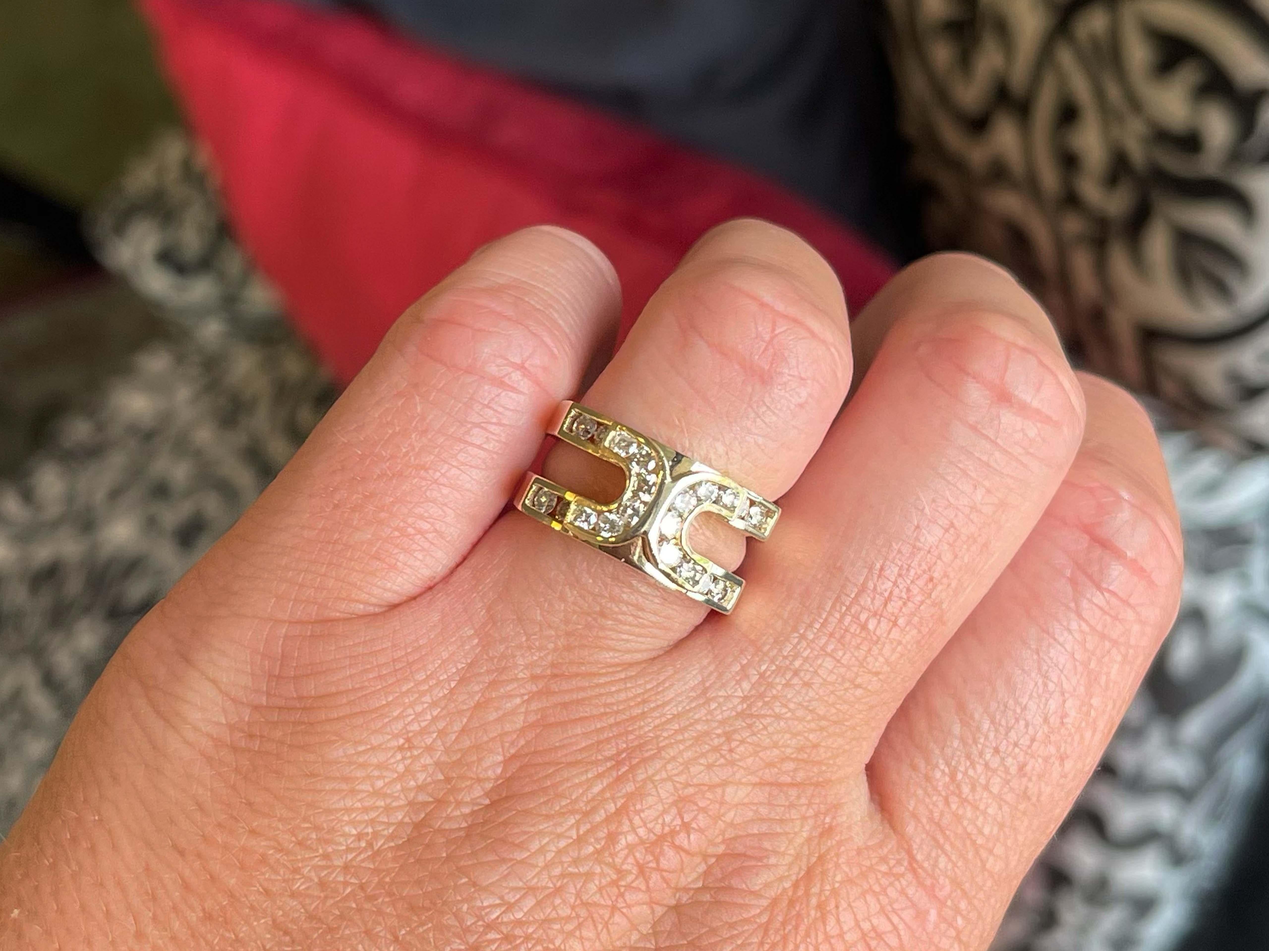 Item Specifications:

Metal: 14K Yellow Gold

​​​Ring Size: 7

Total Weight: 10.0 Grams

Diamond Count: 20 Brilliant cut diamonds

Diamond Carat Weight: ~0.60 Carat

Diamond Color: I-J

Diamond Clarity: SI1-SI2

Condition: Preowned, excellent
