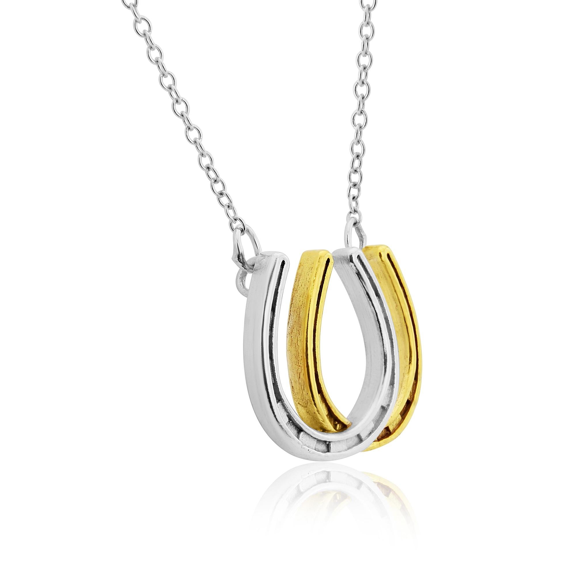 This is a design unique to Simon Kemp, a third generation English Jeweller.
He has captured the detail within the horseshoes and created a beautiful piece of jewellery by using 18K Gold vermeil on top of the solid sterling silver.
The chain is 18 
