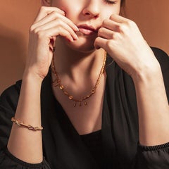 Double Infinity Sign Flexible 22 Karat Gold Bracelet Adorned with Diamonds