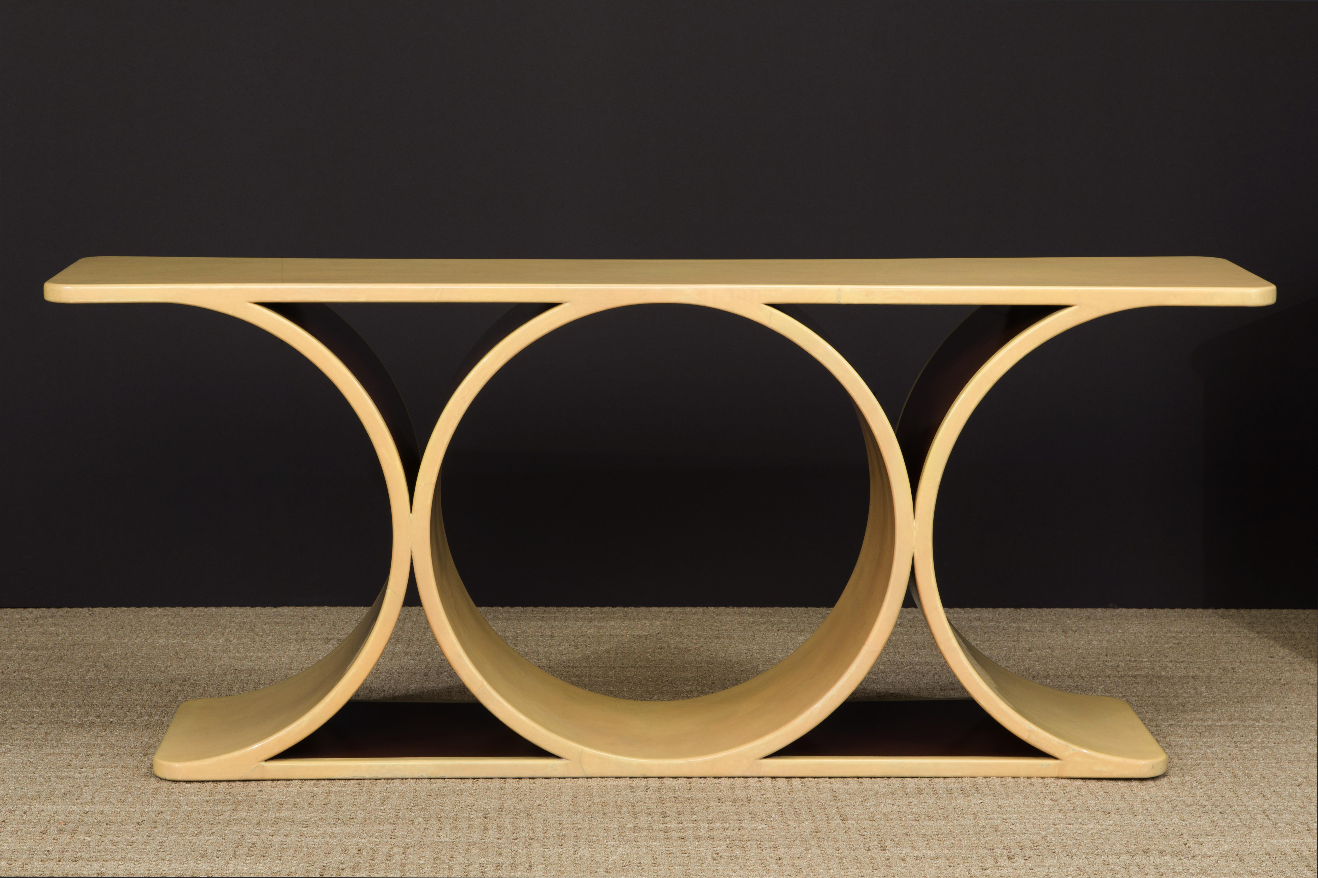 This is a truly exquisite collectors item, and equally sought after by top interior designers, the 'Double JMF' console table in lacquered goatskin by Karl Springer. This example was crafted in 1977 and is considered an 'original production' example