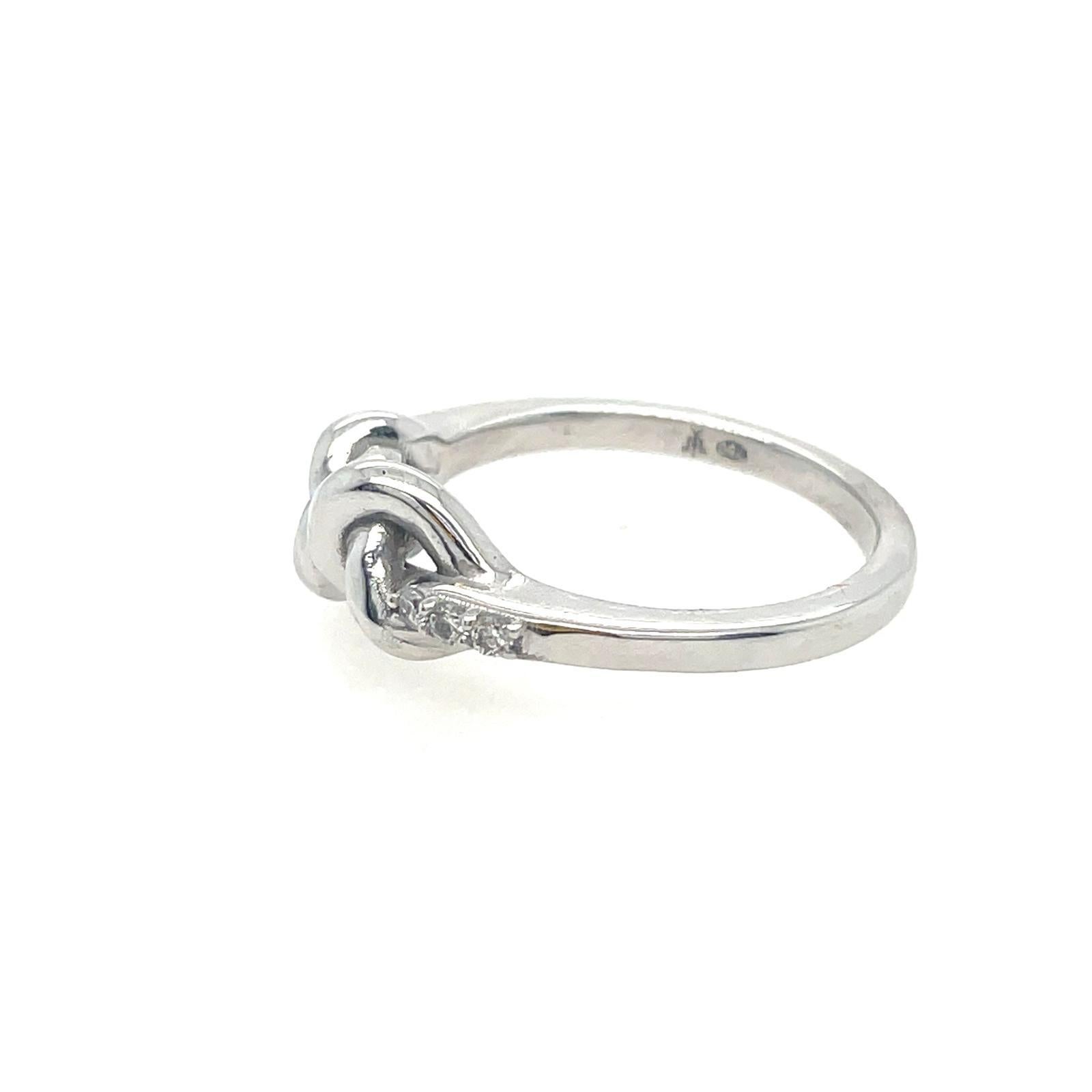 For Sale:  Double knot band in 18ct white gold with diamonds  2