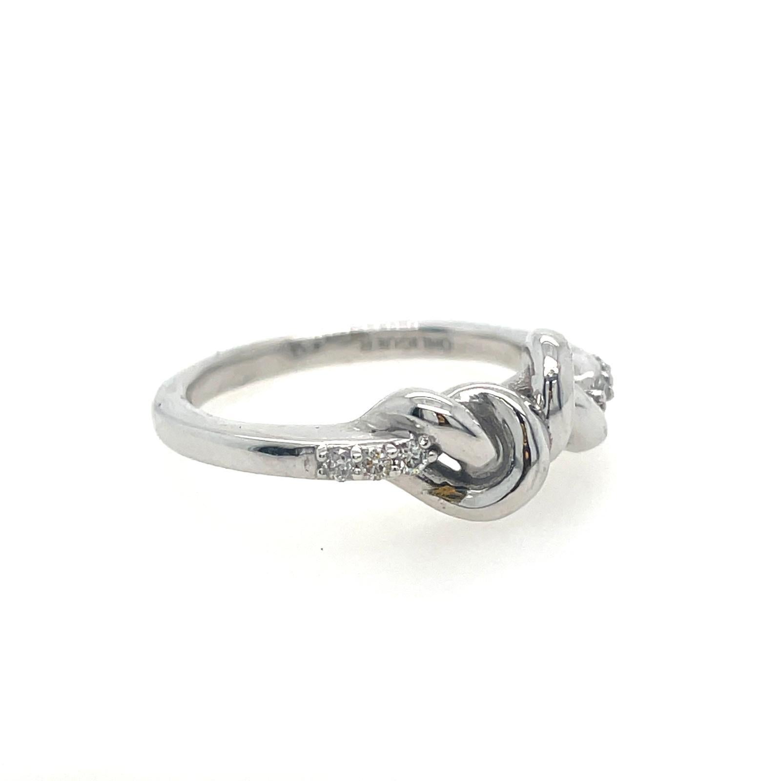 For Sale:  Double knot band in 18ct white gold with diamonds  3