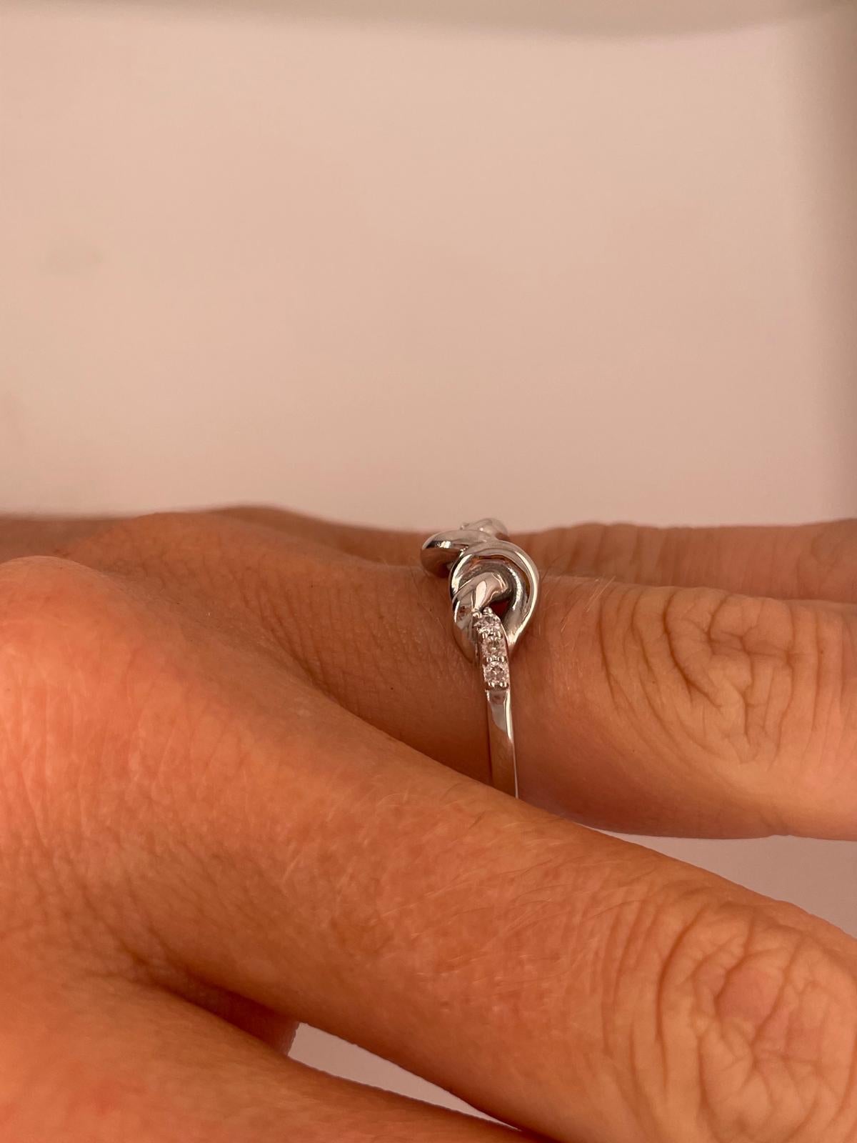For Sale:  Double knot band in 18ct white gold with diamonds  6