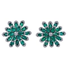 Double layer floral Earrings in 18 Karat white gold with Emeralds and Diamonds