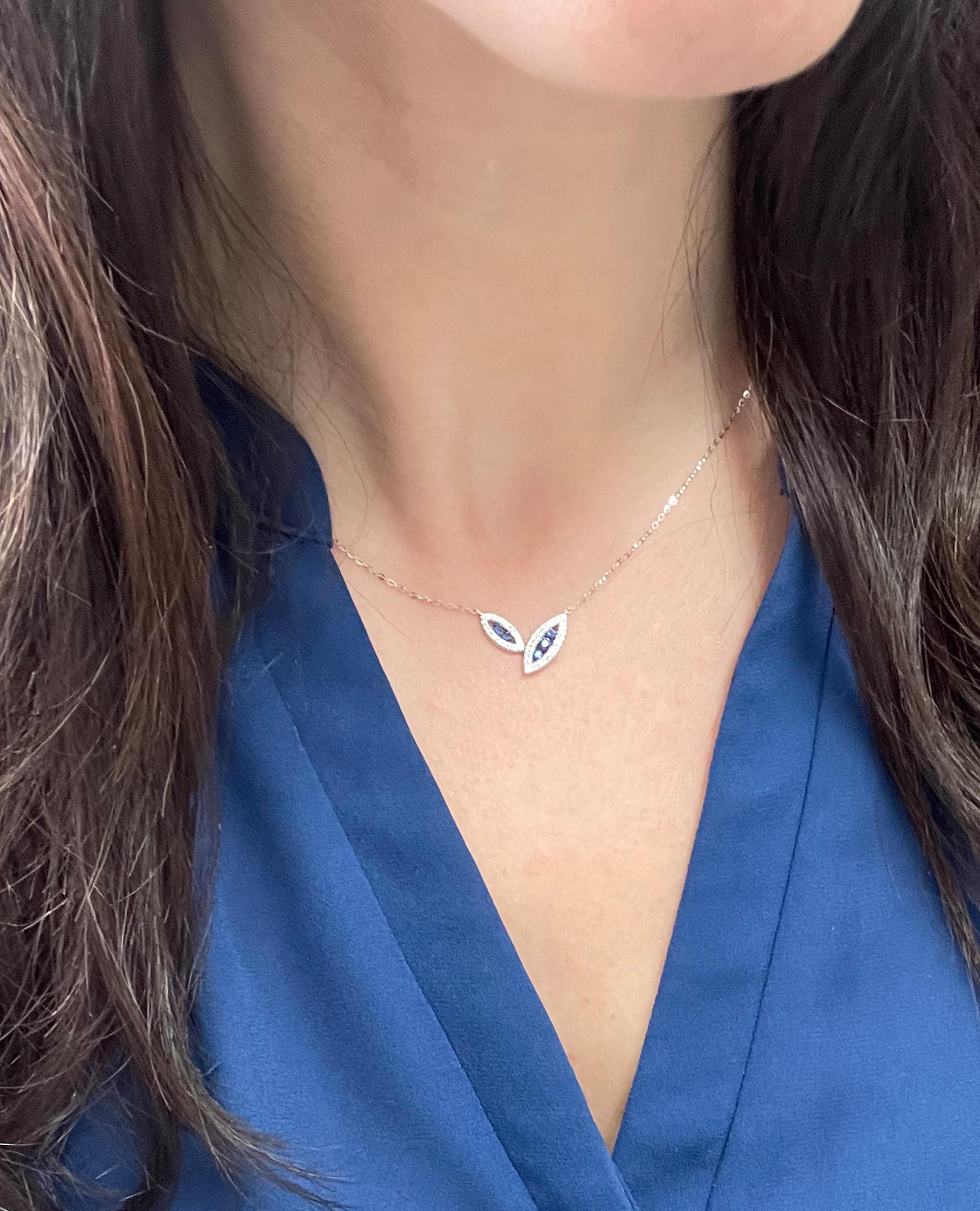 14K Weißgold Halskette mit 5 blauen Saphiren 0,26 Karat und 46 runden Diamanten 0,13 Karat.