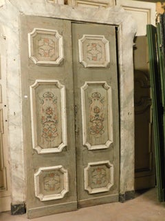Double-leaf door in lacquered and painted wood with original frame, Italy