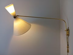 Double light wall bracket, oriantable, Maison Lunel Circa 1950