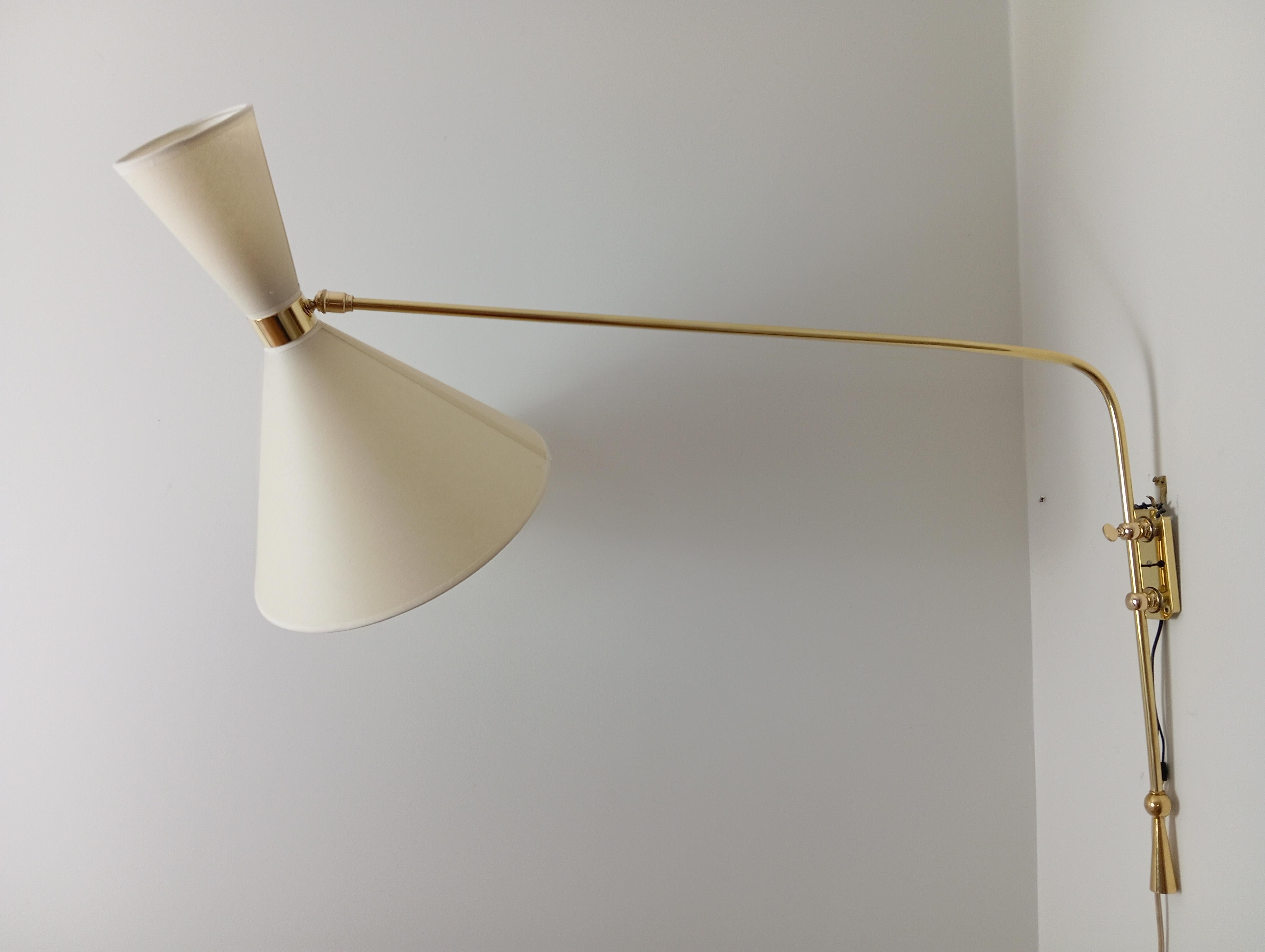 Mid-Century Modern Double light wall bracket, oriantable, Maison Lunel Circa 1950 For Sale