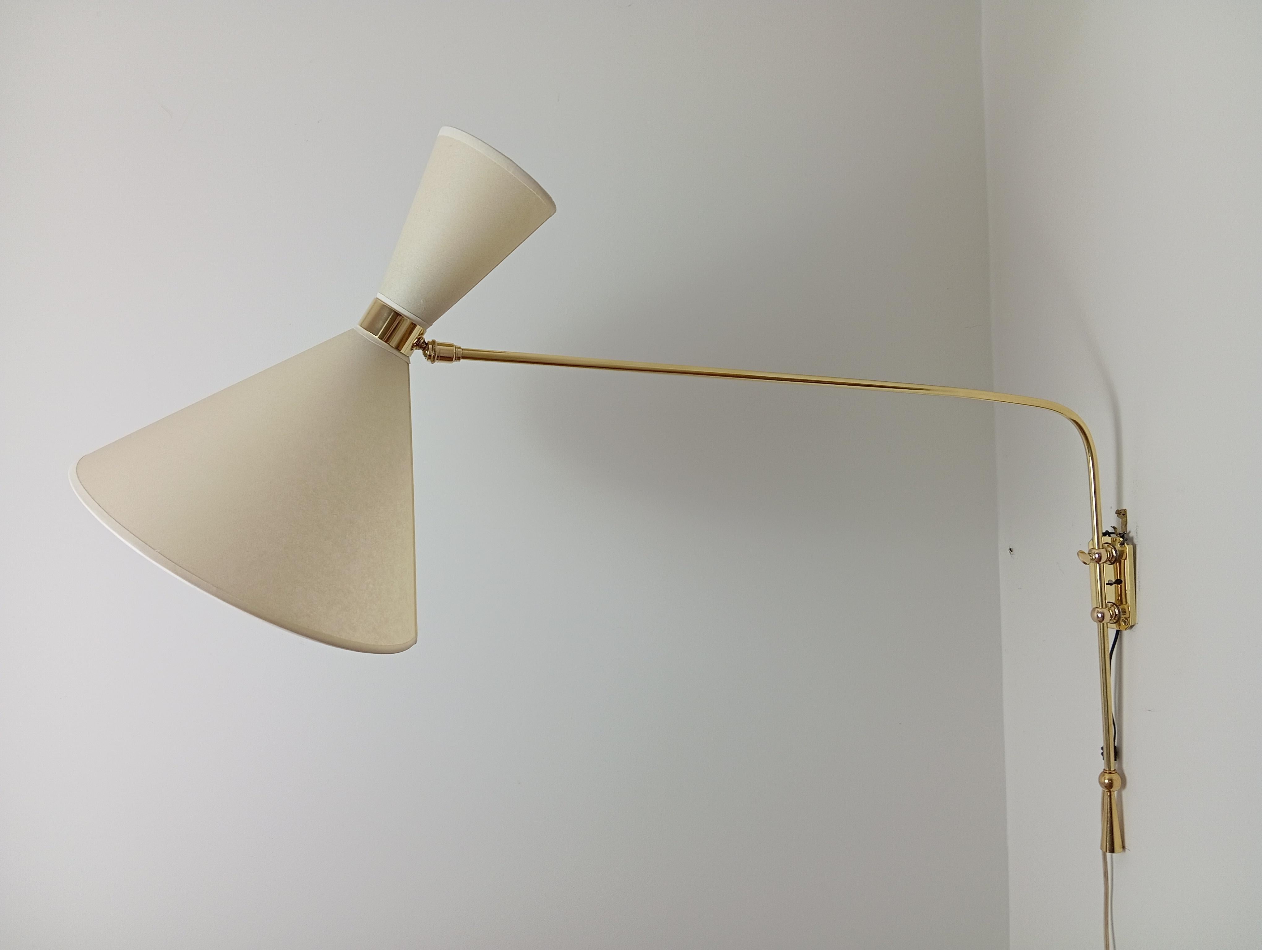 20th Century Double light wall bracket, oriantable, Maison Lunel Circa 1950 For Sale