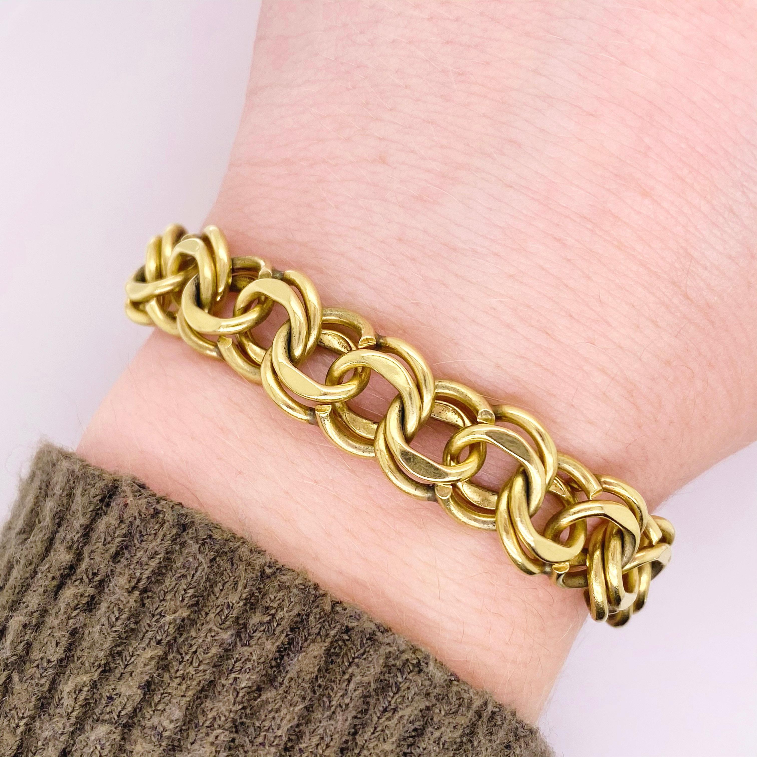 This is a handmade double link bracelet. Each link was hand made and put together to make this gorgeous, double link design. The bracelet is solid 14 karat yellow gold with a unique, one of a kind clasp. This clasp has a very special feature, there