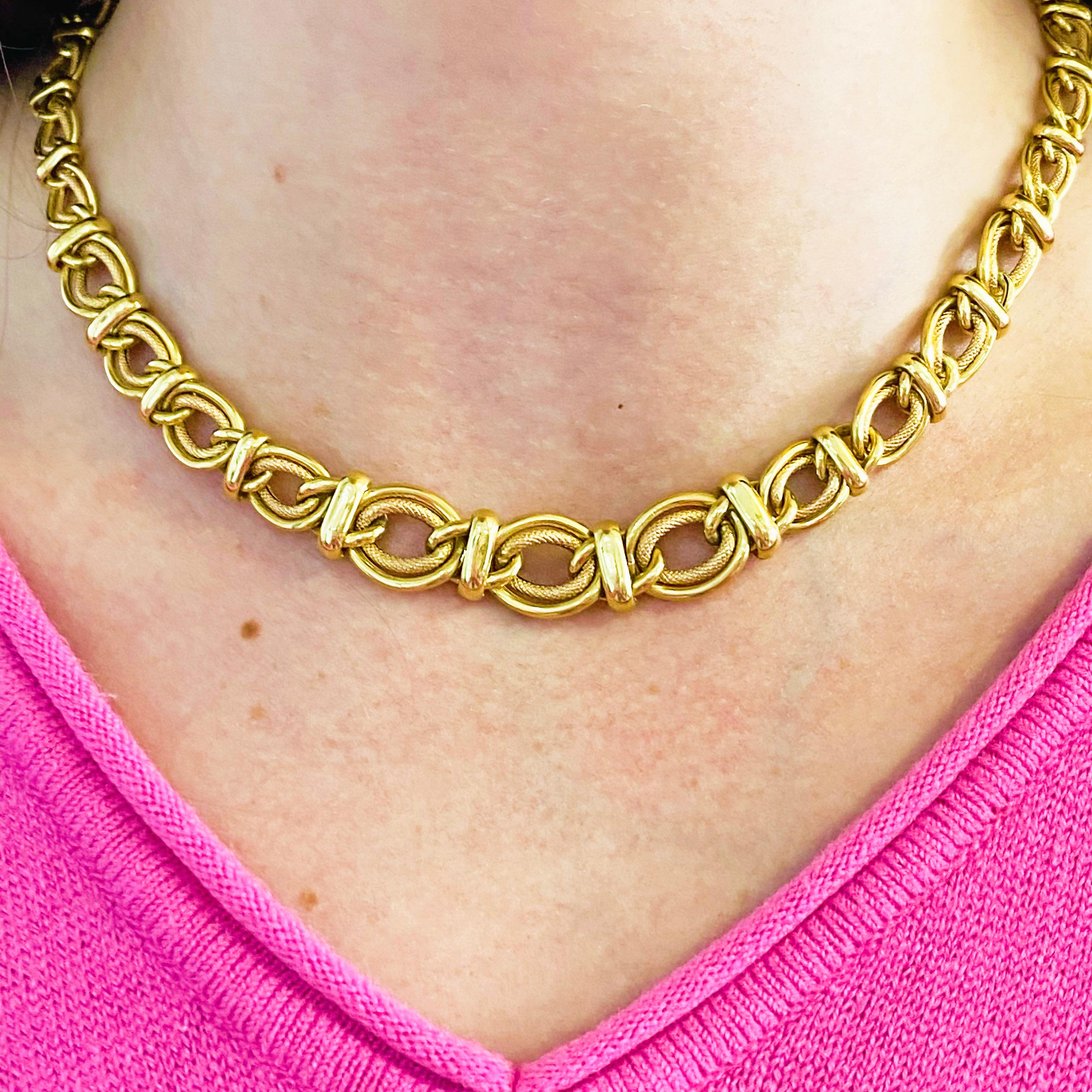 This brilliant 14 karat yellow gold chain choker necklace is extremely versatile! It provides a classic look that pairs well with both casual and formal wear. The necklace is unique in that it has a sailor’s knot on each link and it tapers to get
