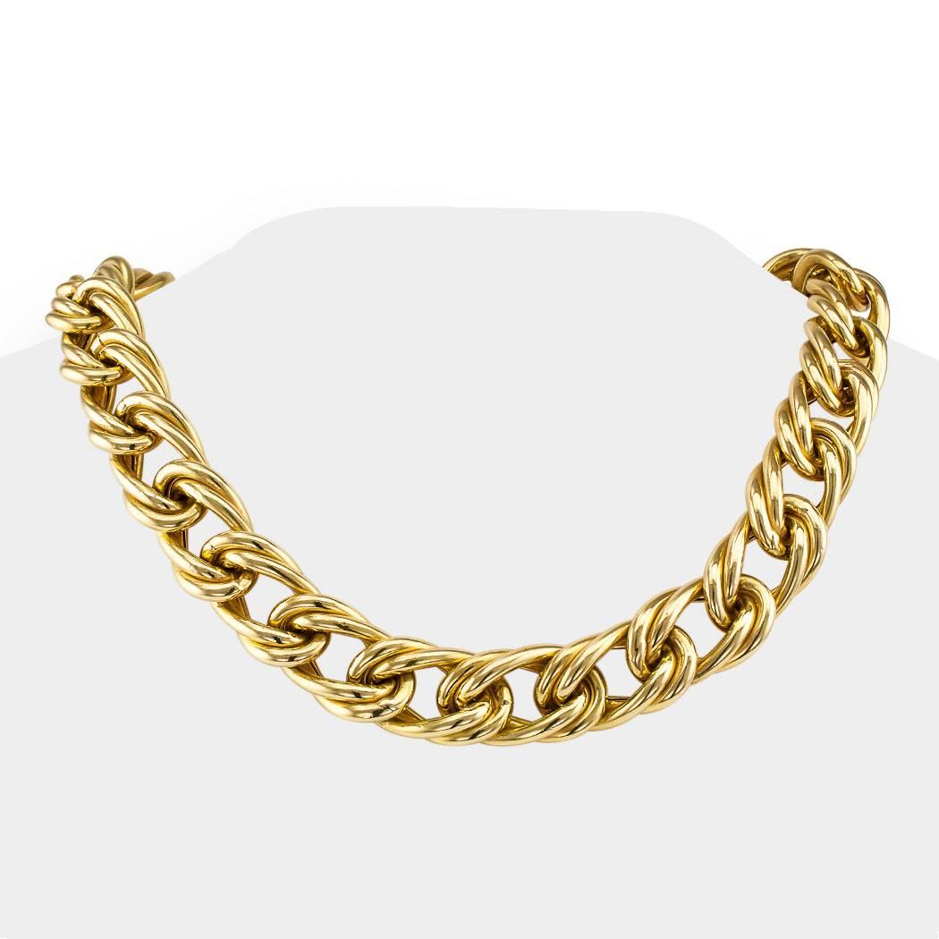 Double link gold necklace circa 1980.  Designed as a series of entwined double links crafted in 18-karat yellow gold.  Simple in design, but it is that very simplicity that makes this beautiful necklace extremely elegant and sophisticated, a joy to