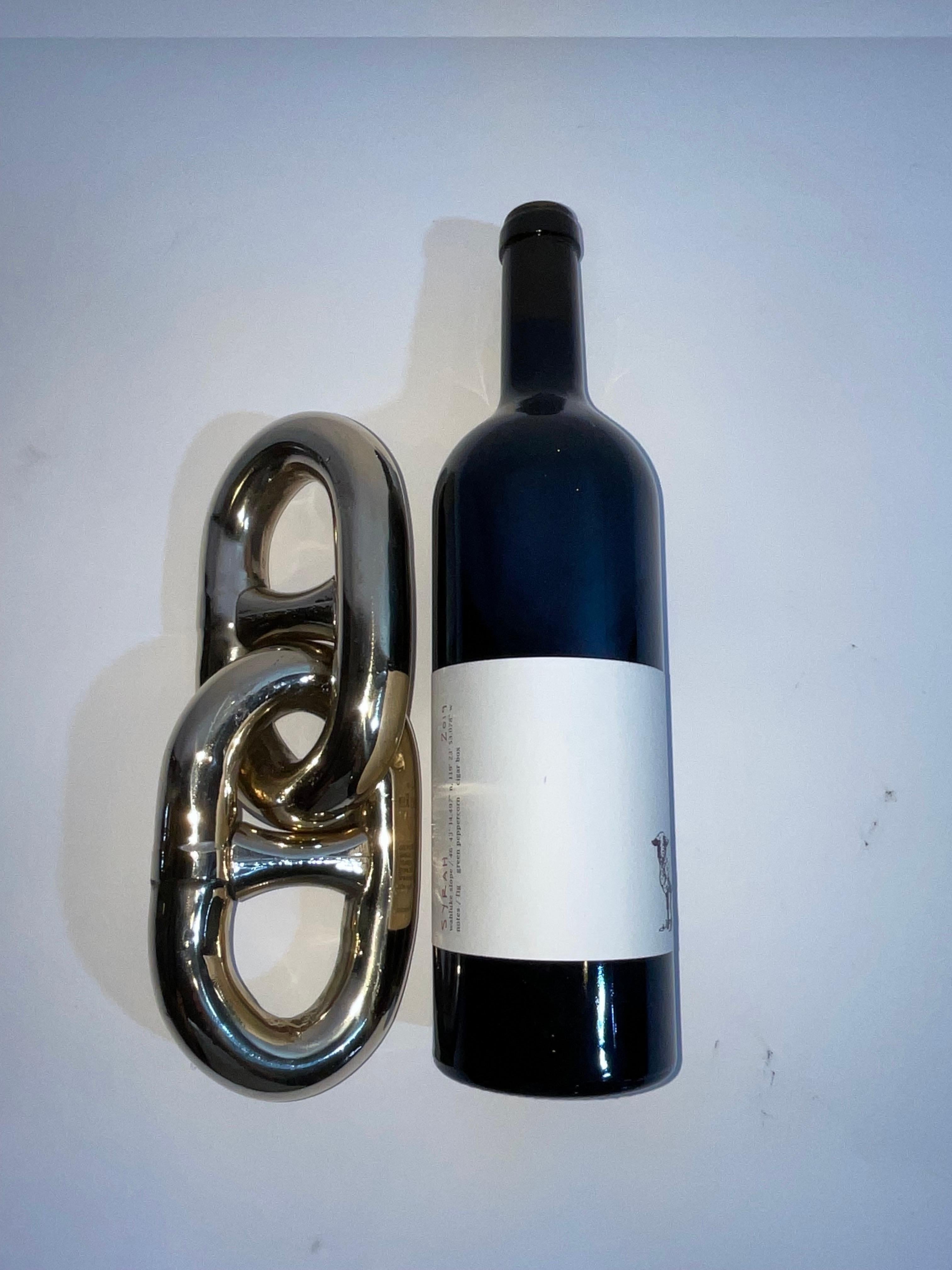 Very heavy double link of minesweeper stud link chain. Made of solid manganese bronze. Meticulously polished and lacquered a unique maritime display. It looks like solid gold.

Weight:    7 lbs.
Overall Dimensions:    10
